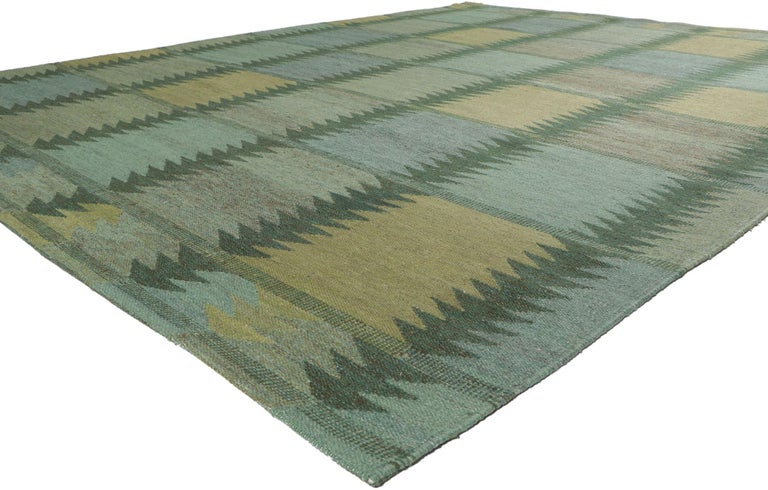 30799 New Swedish Marianne Richter Inspired Kilim Rug 09'02 x 11'07. With its simplicity and geometric design, this hand-woven wool Swedish inspired Kilim rug provides a feeling of cozy contentment without the clutter. The abrashed field features an