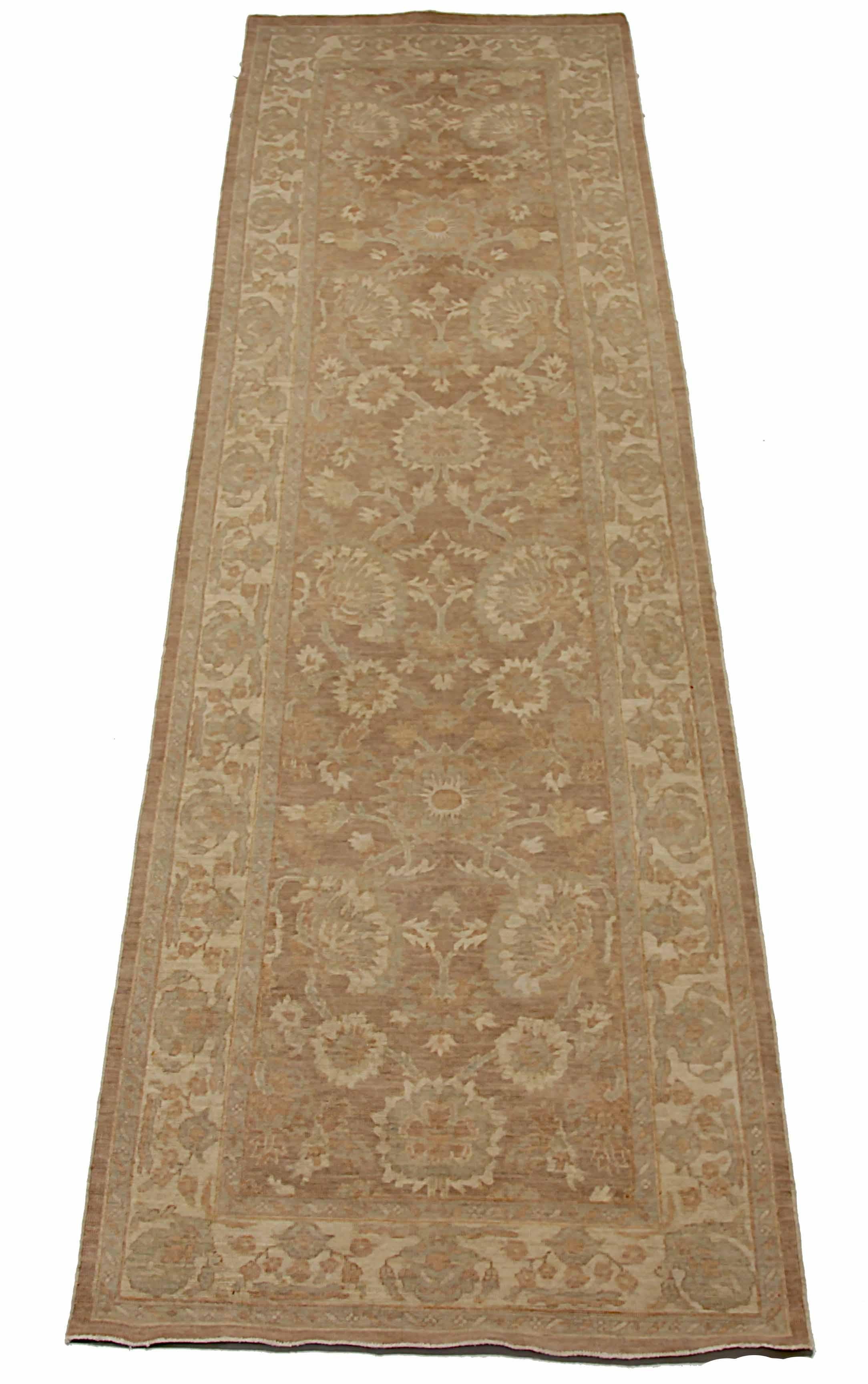 New Afghan runner rug handwoven from the finest sheep’s wool. It’s colored with all-natural vegetable dyes that are safe for humans and pets. It’s a traditional Tabriz design woven by expert artisans. In addition to the fine weaving, this rug