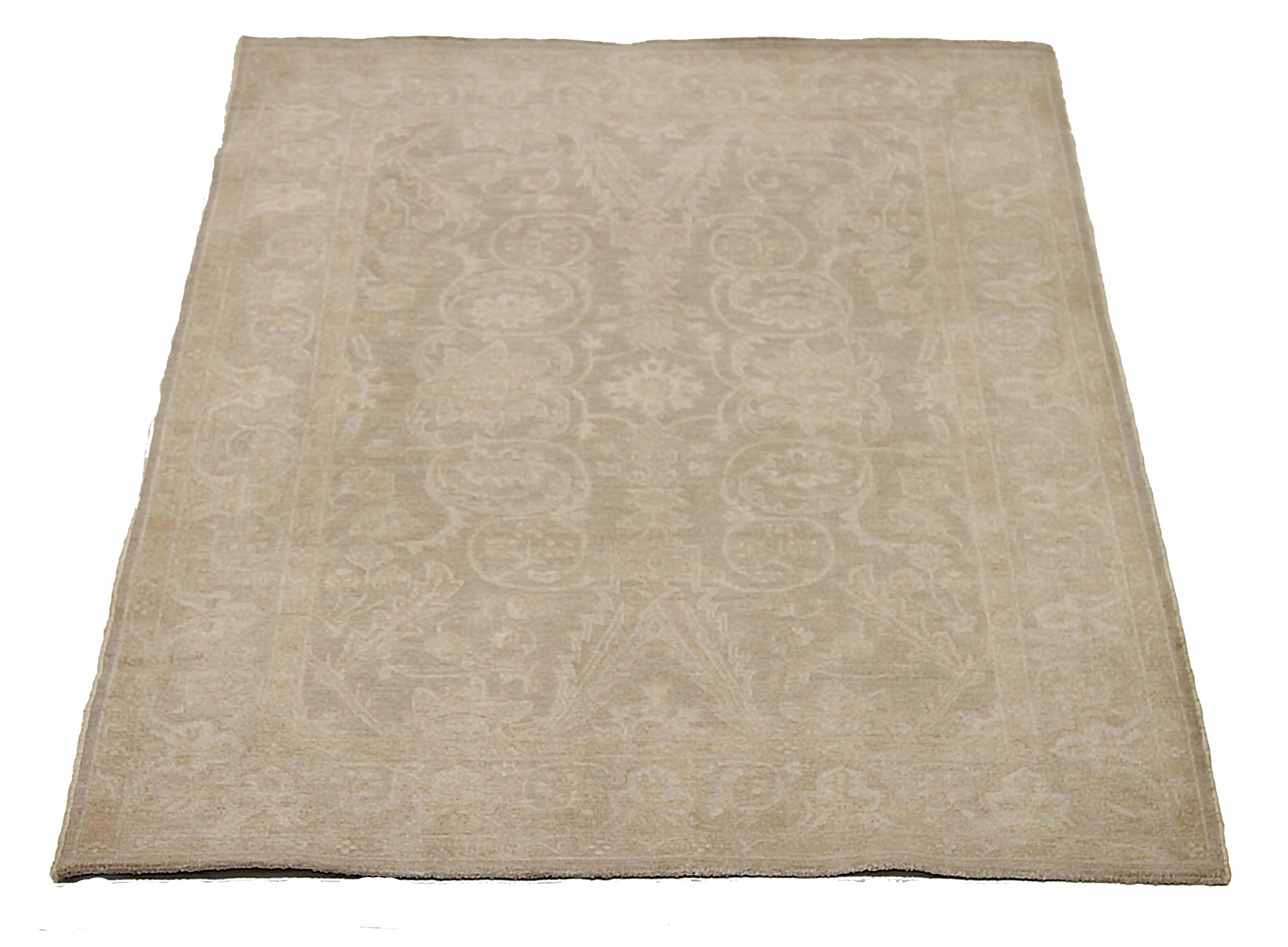 New Afghan area rug handwoven from the finest sheep’s wool. It’s colored with all-natural vegetable dyes that are safe for humans and pets. It’s a traditional Tabriz design woven by expert artisans. In addition to the fine weaving, this rug