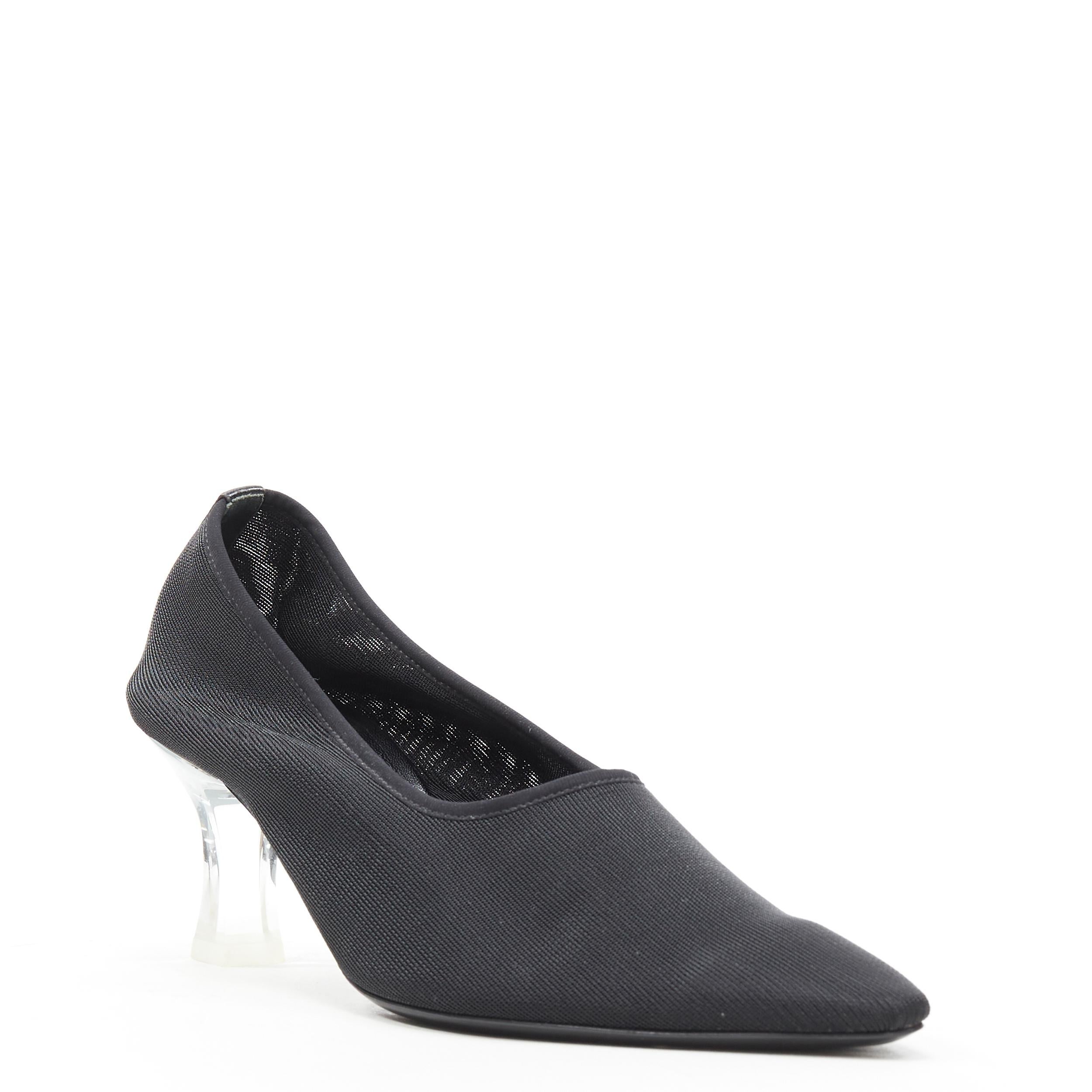 new THE ROW black sock mesh lucite PVC mid heel pointy pump EU36 
Reference: TGAS/B01225 
Brand: The Row 
Model: Sock Pump Lucite Heel 
Material: Mesh 
Color: Black 
Pattern: solid 
Extra Detail: Stretch nylon sock fit. Pointed toe. Lucite clear