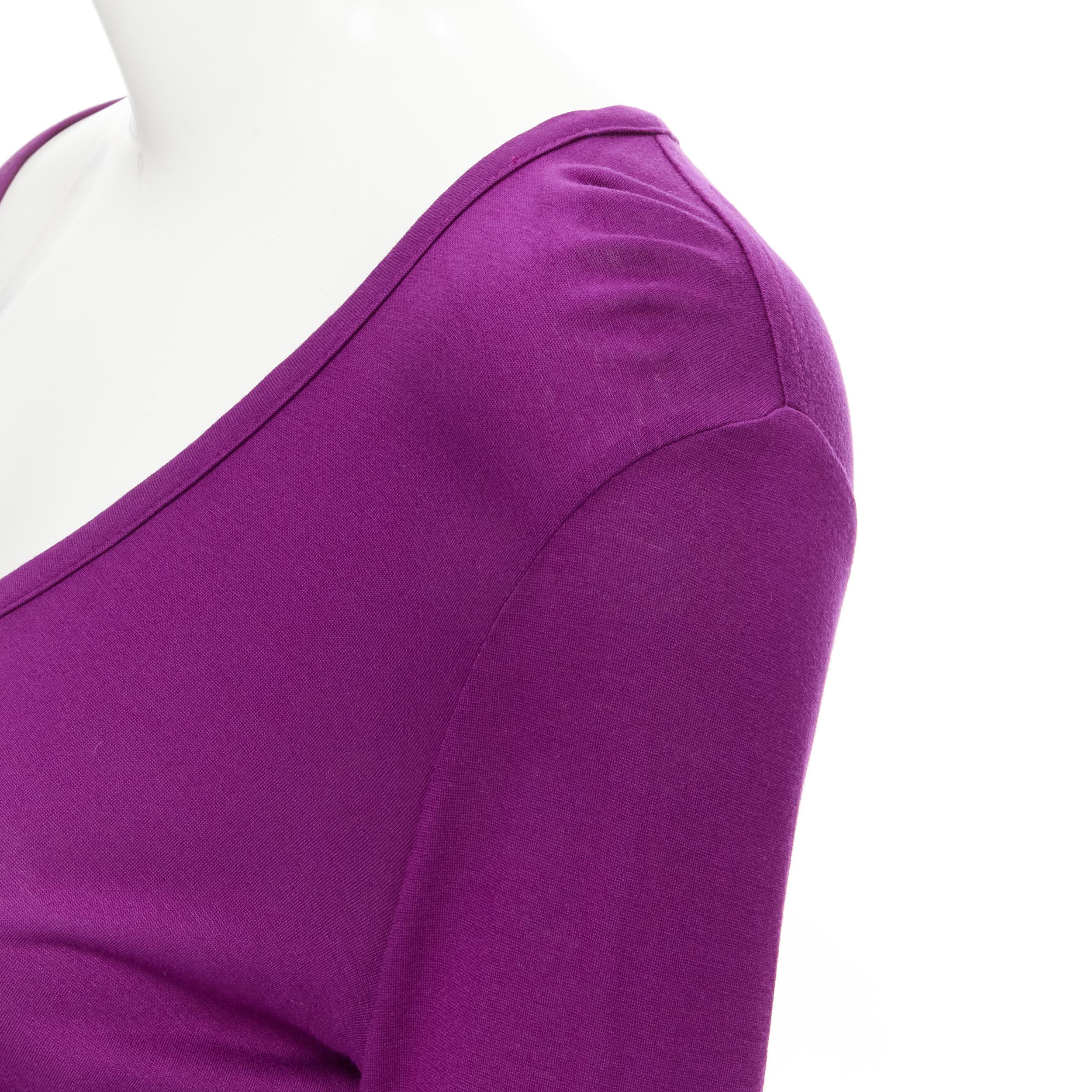 new THE ROW Hazelton 100% viscose purple scoop neck long sleeve tshirt S 
Reference: MELK/A00115 
Brand: The Row 
Material: Viscose 
Color: Purple 
Pattern: Solid 
Made in: USA 

CONDITION: 
Condition: New with tags. 
Comes with: Designer tags.