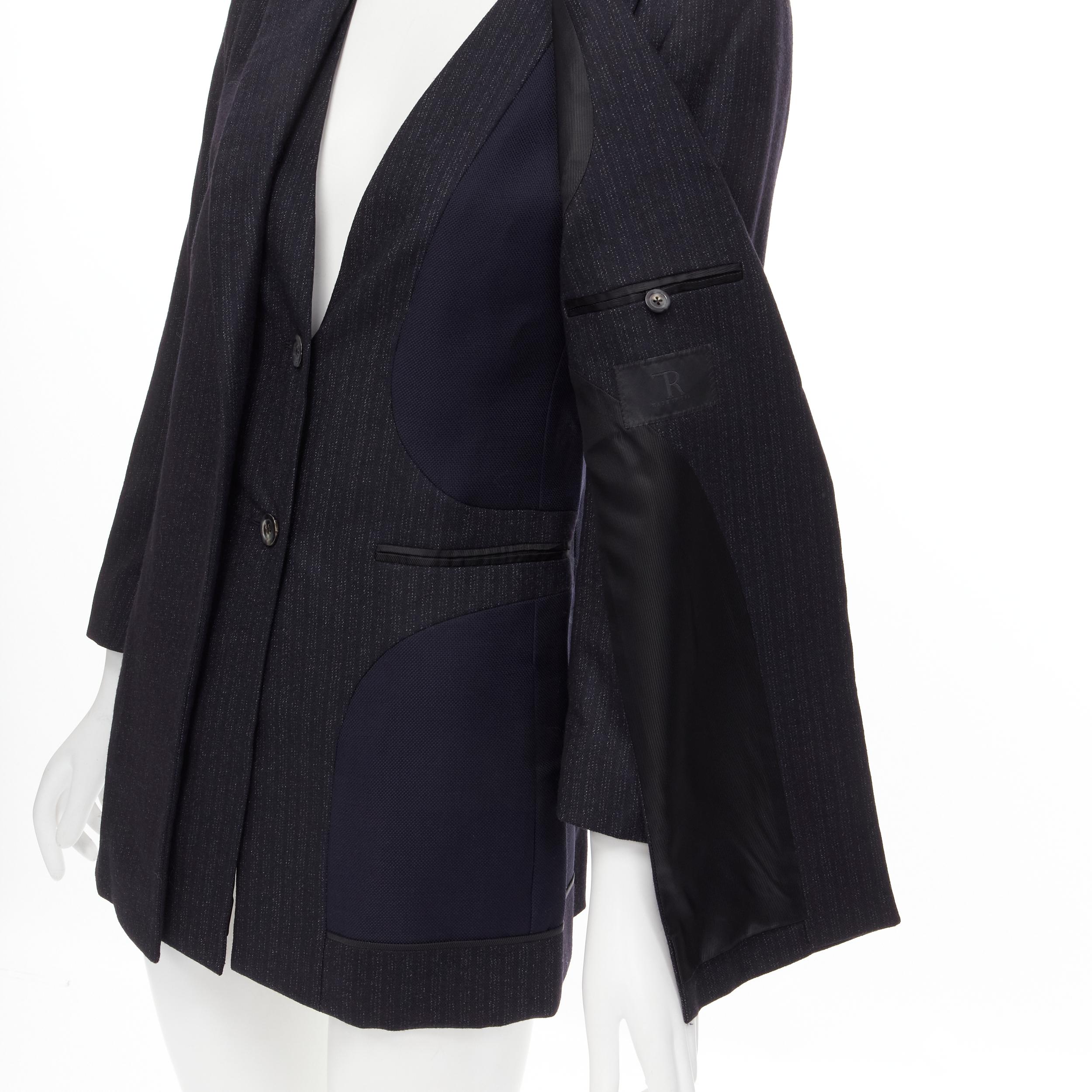 new THE ROW Neril dark navy pinstriped layered flap front blazer jacket US2 
Reference: MELK/A00013 
Brand: The Row 
Material: Wool 
Color: Grey 
Pattern: Pinstripe 
Closure: Button 
Extra Detail: Layered front design. Exposed lining design. Long
