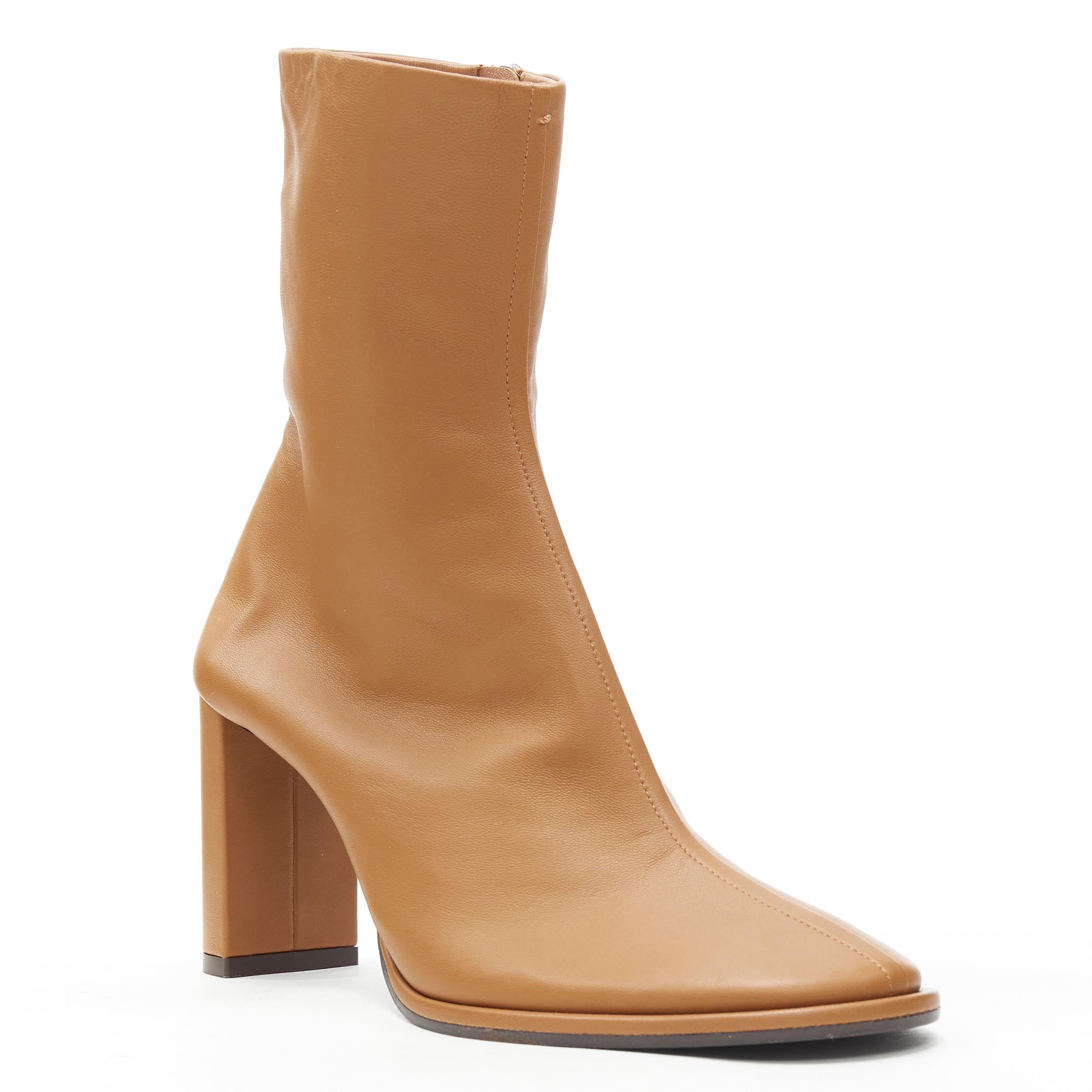 new THE ROW Teatime Zip tan brown leather round toe block heel boots EU38.5 
Reference: TGAS/B01223 
Brand: The Row 
Material: Leather 
Color: Brown 
Pattern: Solid 
Closure: Zip 
Extra Detail: Round toe. Extended leather wrapped outsole. Soft