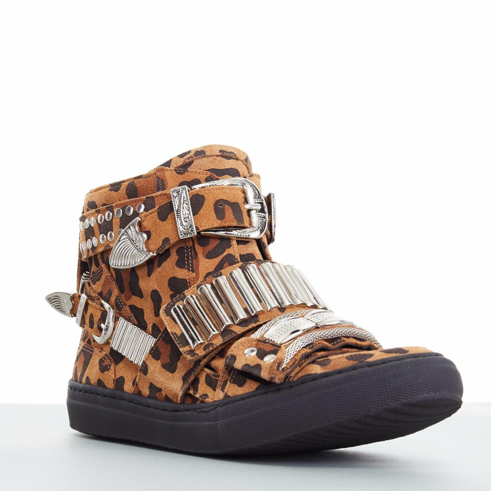 new TOGA PULLA leopard print silver hardware plate buckled sneakers EU38 US8
TOGA PULLA
Brown leopard printed upper . 
Western cowboy inspired silver hardware plaque and hardware . 
Rounded toe . 
Black rubber outsole . 
Buckle and magic tape