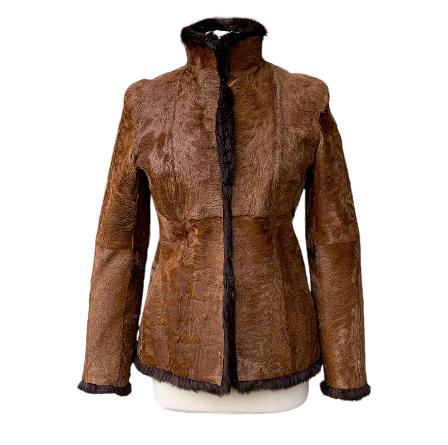 Tom Ford for Gucci Reversible Brown Fur Jacket
1999 Collection
Italian size - 42
Brown Color Calf Hair Reverse to Dark Brown Color Rabbit Fur.
Split Pockets at Sides. Hook and Eye Closure.
Measurements: Length - 27 inches, Sleeve - 25 inches, Armpit