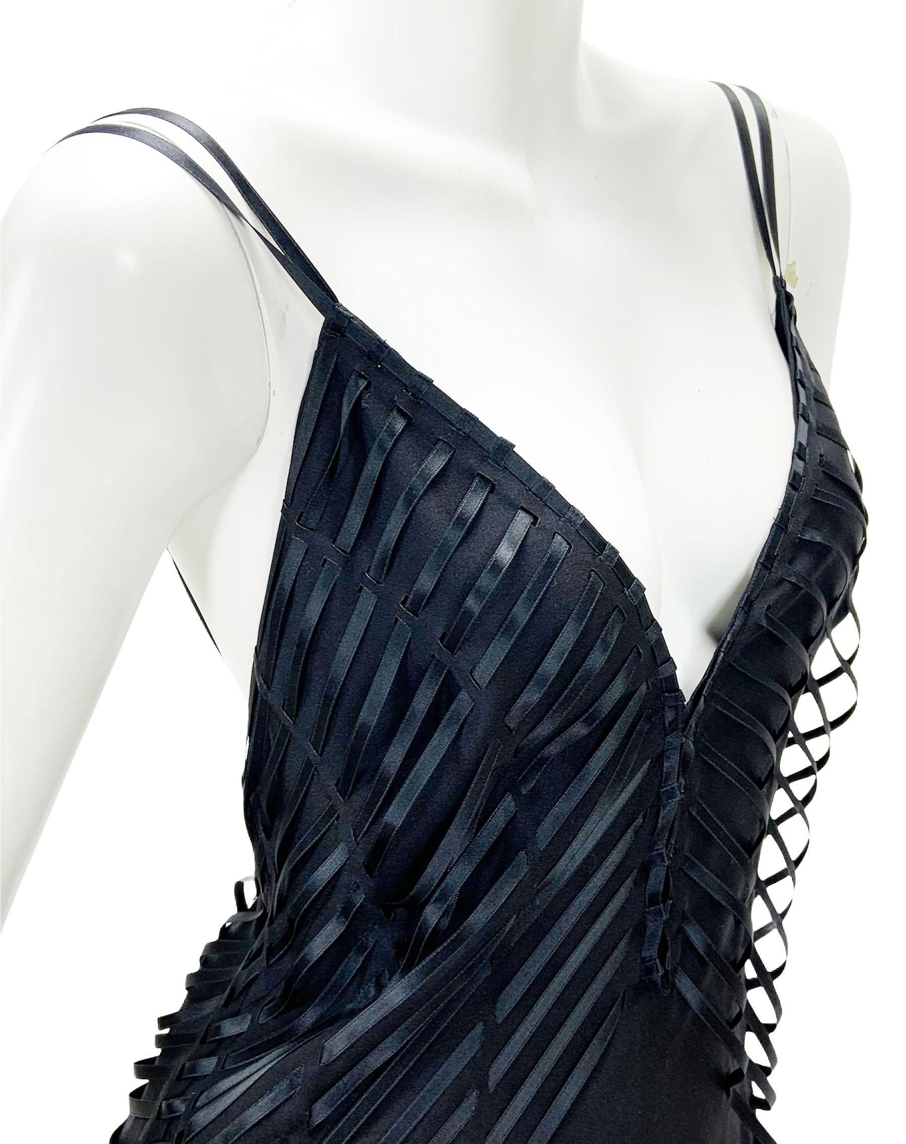 New Tom Ford for Gucci Black Silk Deep Plunging Dress Gown
2002 Gothic Collection
Designer size 44 - US 8
100% Silk, Deep Plunge, Open Back, Double Spaghetti Straps, Ribbon Applique, Fully Lined, Zip Closure.
Measurements: Length - 64 inches, Bust -