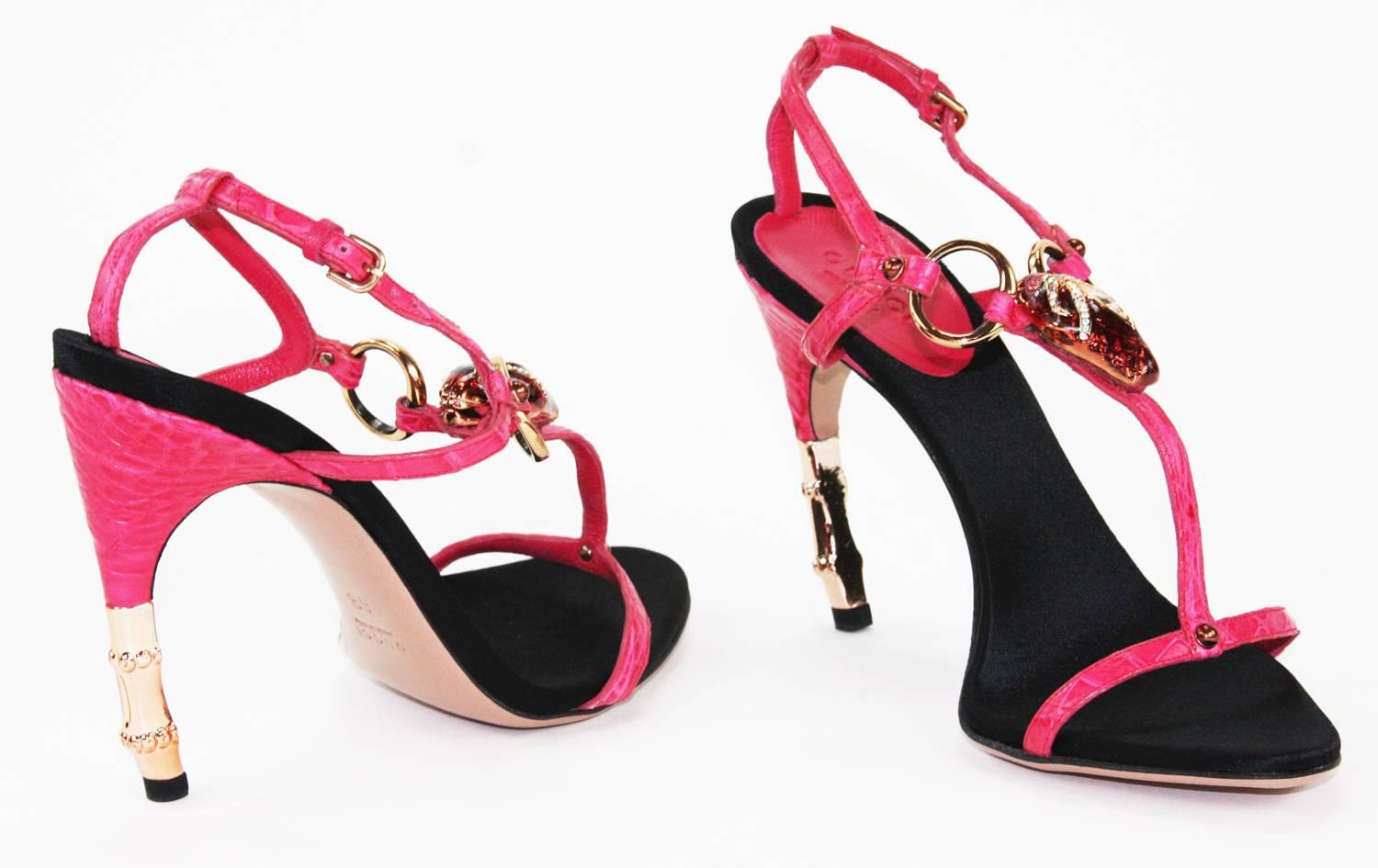 New Tom Ford for Gucci Shoes Sandals
S/S 2004 Collection
US Size - 8 B ( Italian 38 B )
Genuine Crocodile, Raspberry Pink
Jeweled Head Snake Detail
Golden Bamboo Design Heel - 4.25 inches
Leather Sole, Smooth Satin Insole
New without box.

Listing