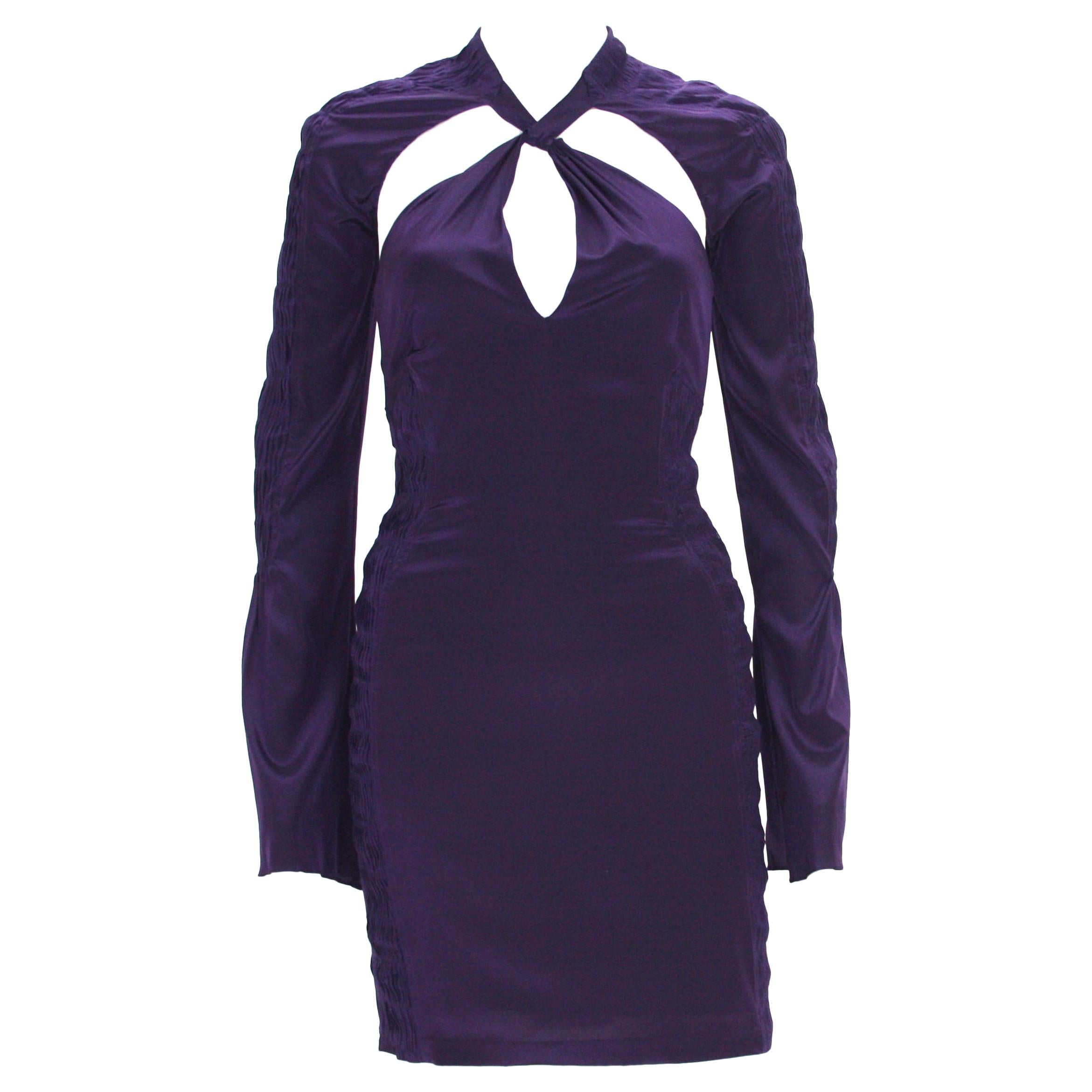 New Tom Ford for Gucci Plunging Backless Mini Sexy Dress
S/S 2004 Collection
Designer size - 38
90% Silk, 10% Spandex; Deep Purple Color, Cut-Out Detail, Bell Sleeve, Fully Lined, Open Back, Gathered Panels,  Zip Closure.
Made in Italy.
New with tag.