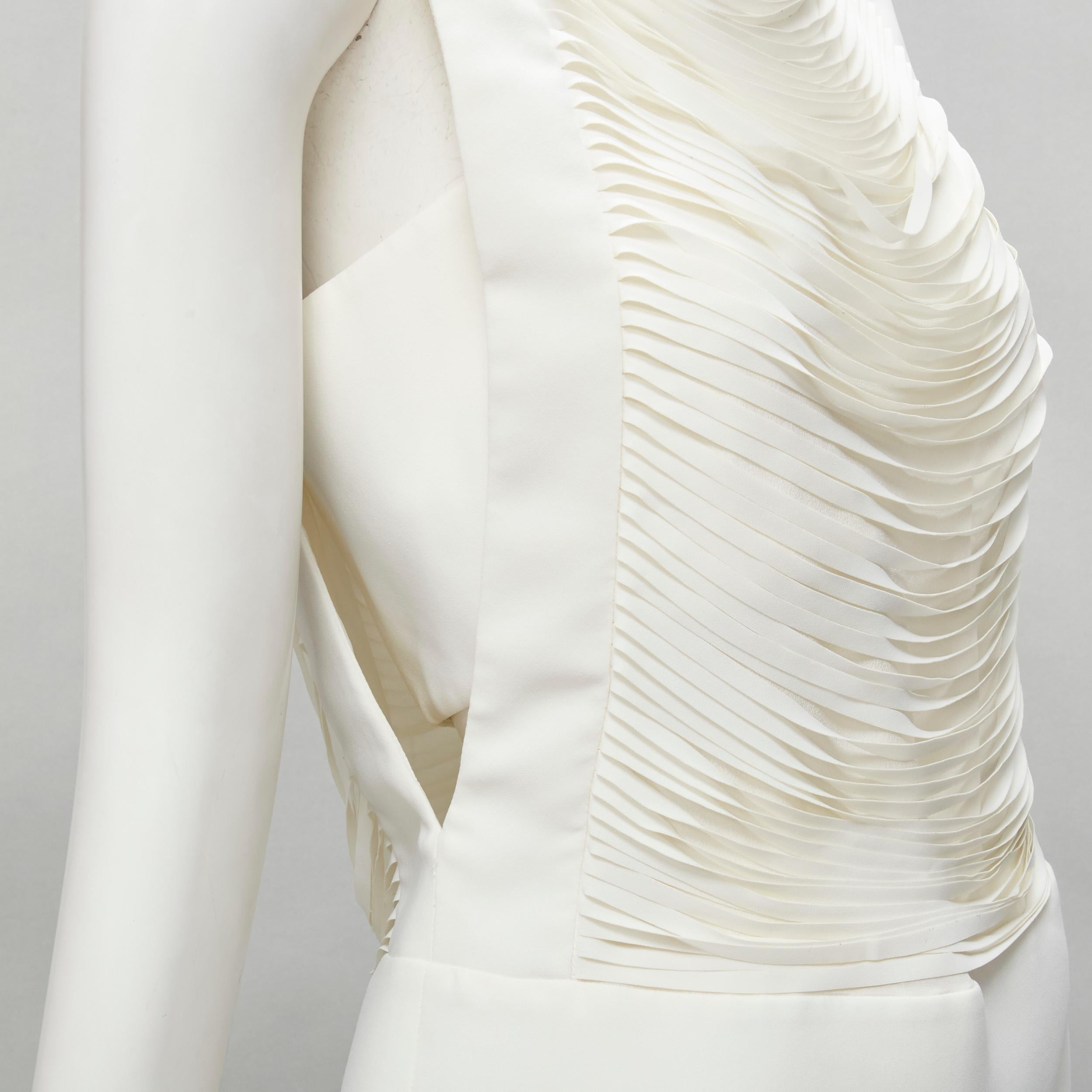 new TOM FORD white laser cut fringe polyester vest bandeau set top IT42 S 
Reference: JACG/A00021 
Brand: Tom Ford 
Designer: Tom Ford 
Material: Polyester 
Color: White 
Pattern: Solid 
Closure: Zip 
Extra Detail: Laser cut fringe at front and