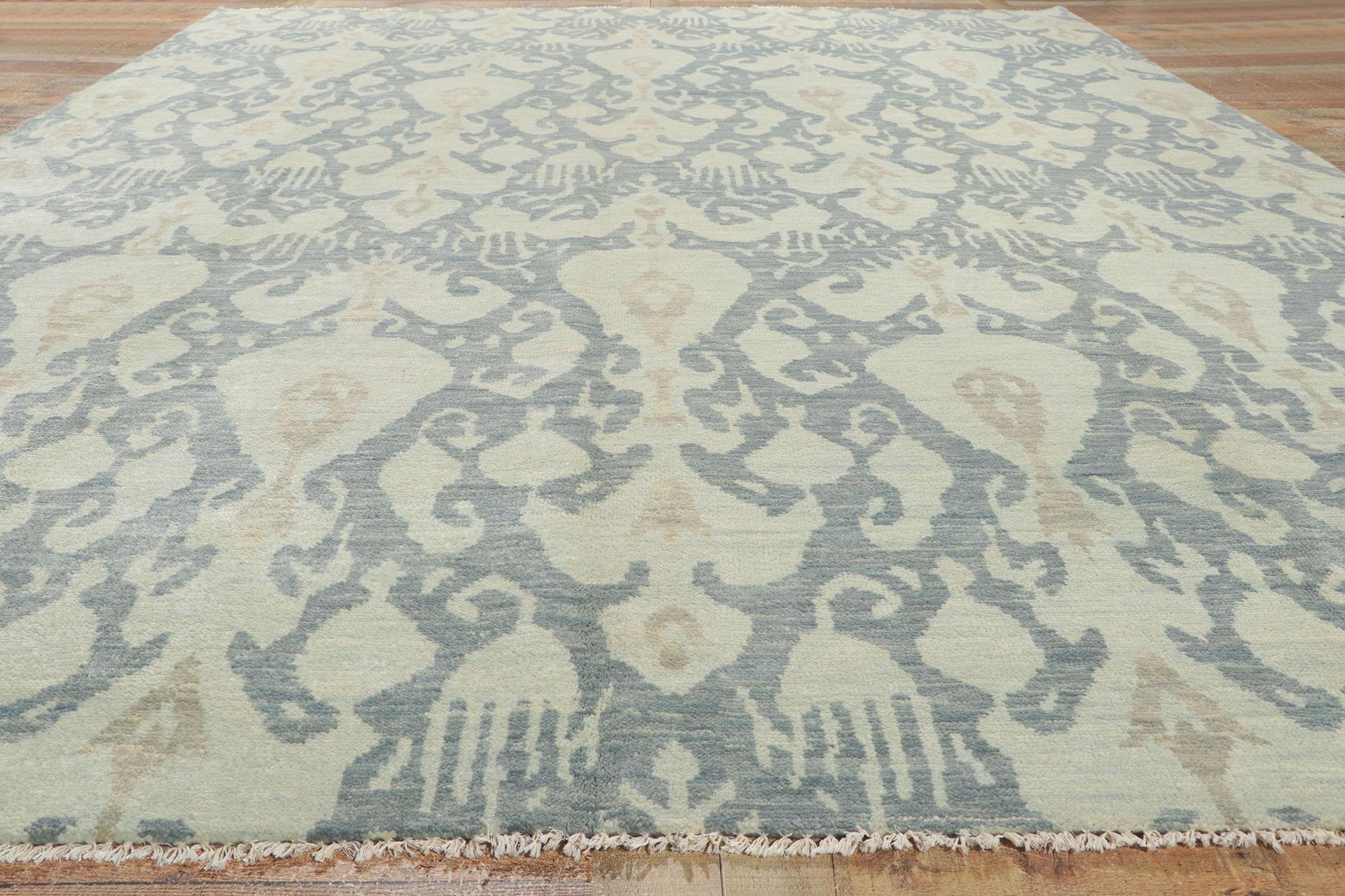 Laine Nouveau tapis de zone transitionnel avec motif Ikat dans de douces couleurs bleues de couleur terre en vente