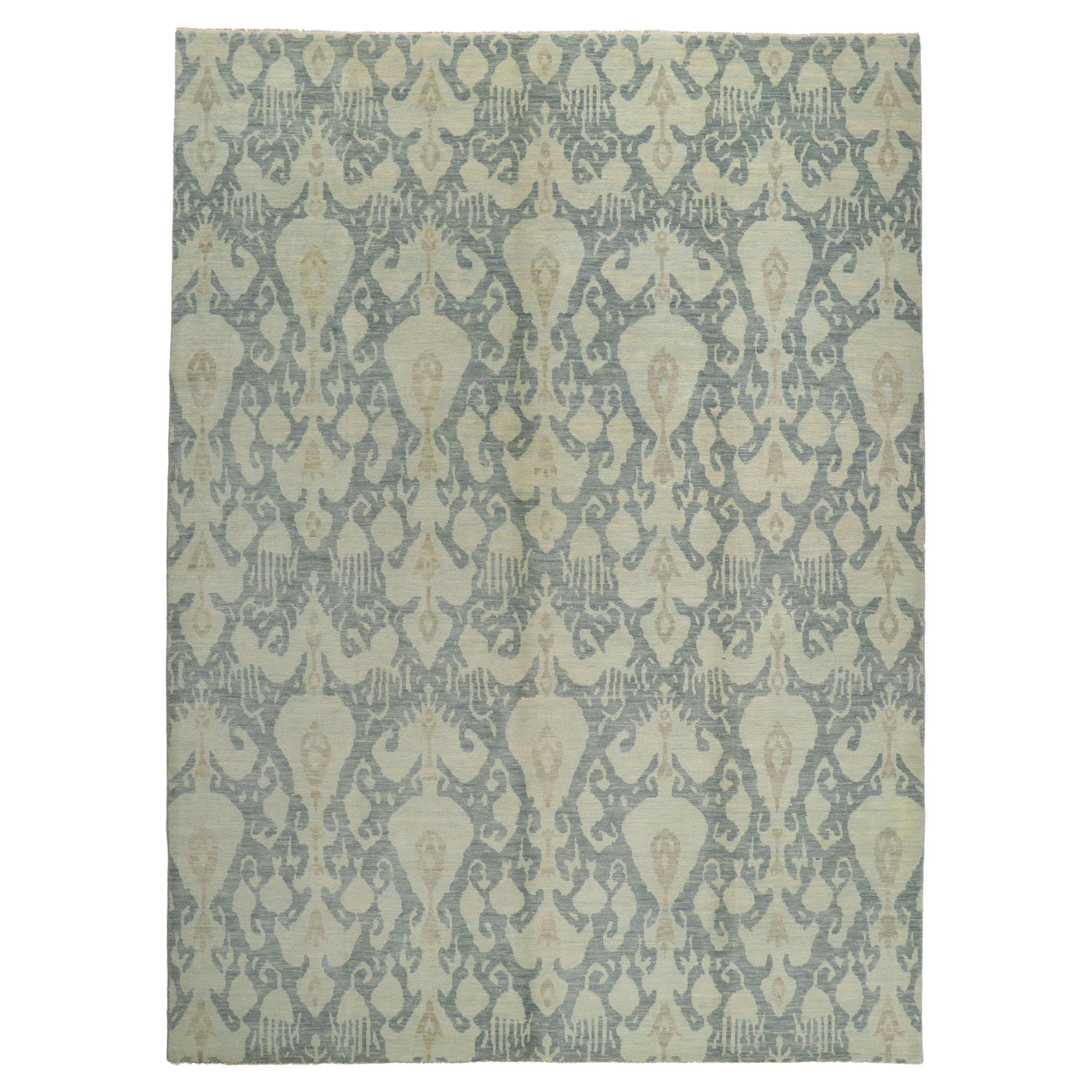 Nouveau tapis de zone transitionnel avec motif Ikat dans de douces couleurs bleues de couleur terre en vente