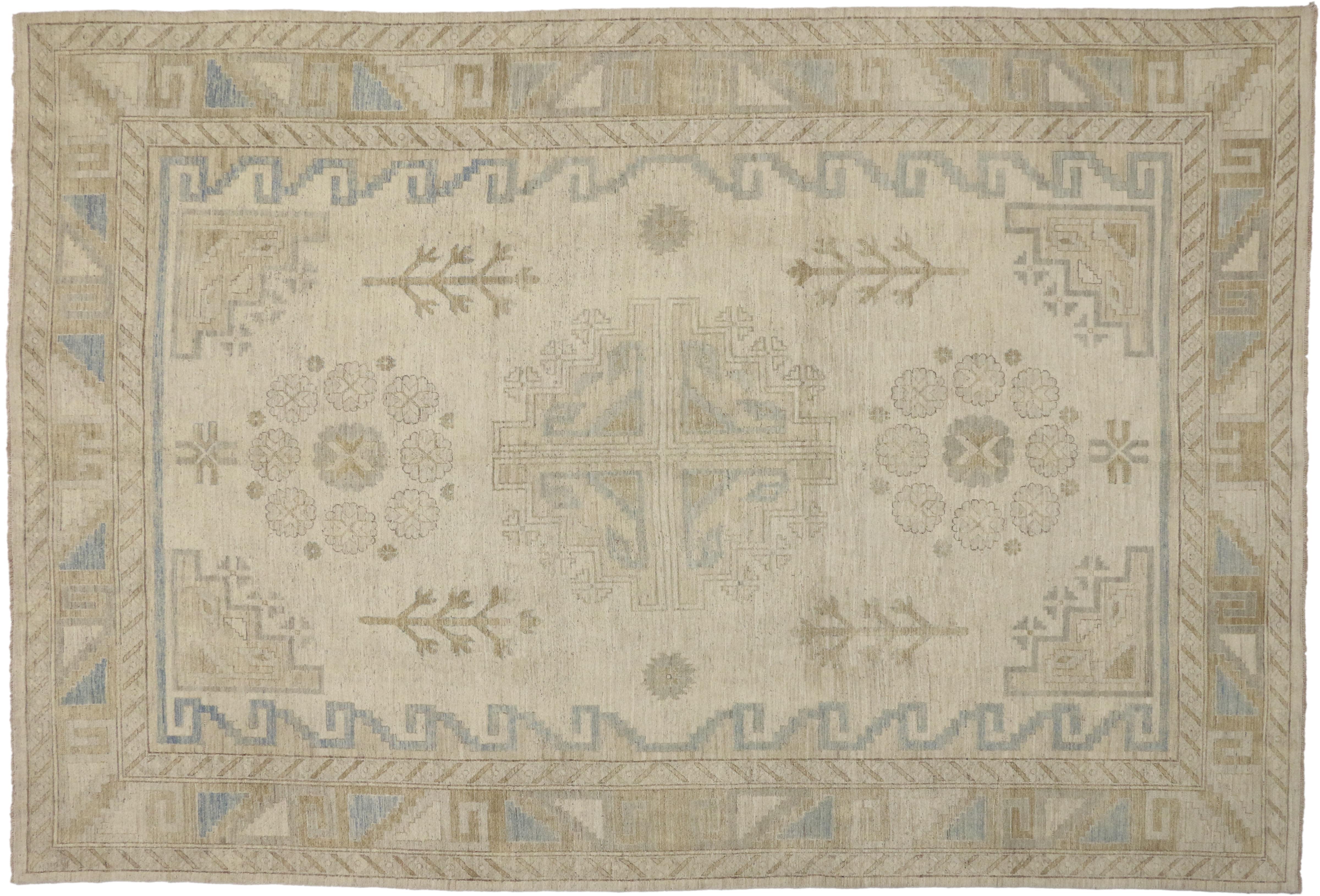 80185 New Transitional Area Rug with Khotan Design in Warm, Neutral Colors. This hand-knotted wool transitional area rug features a Khotan design with a traditional prominent medallion design like most carpets from East Turkestan and Khotan.