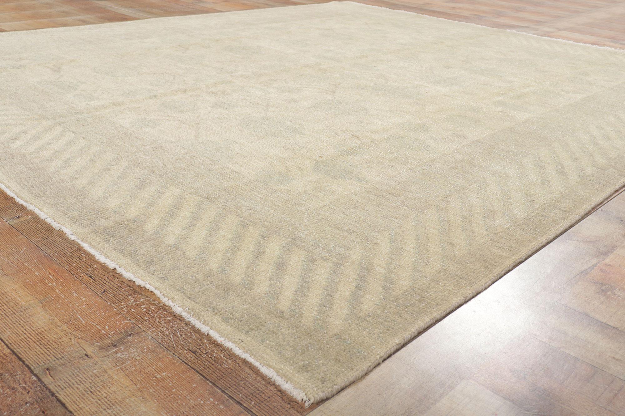 Contemporary New Transitional Khotan Rug with Soft Earth-Tone Colors For Sale