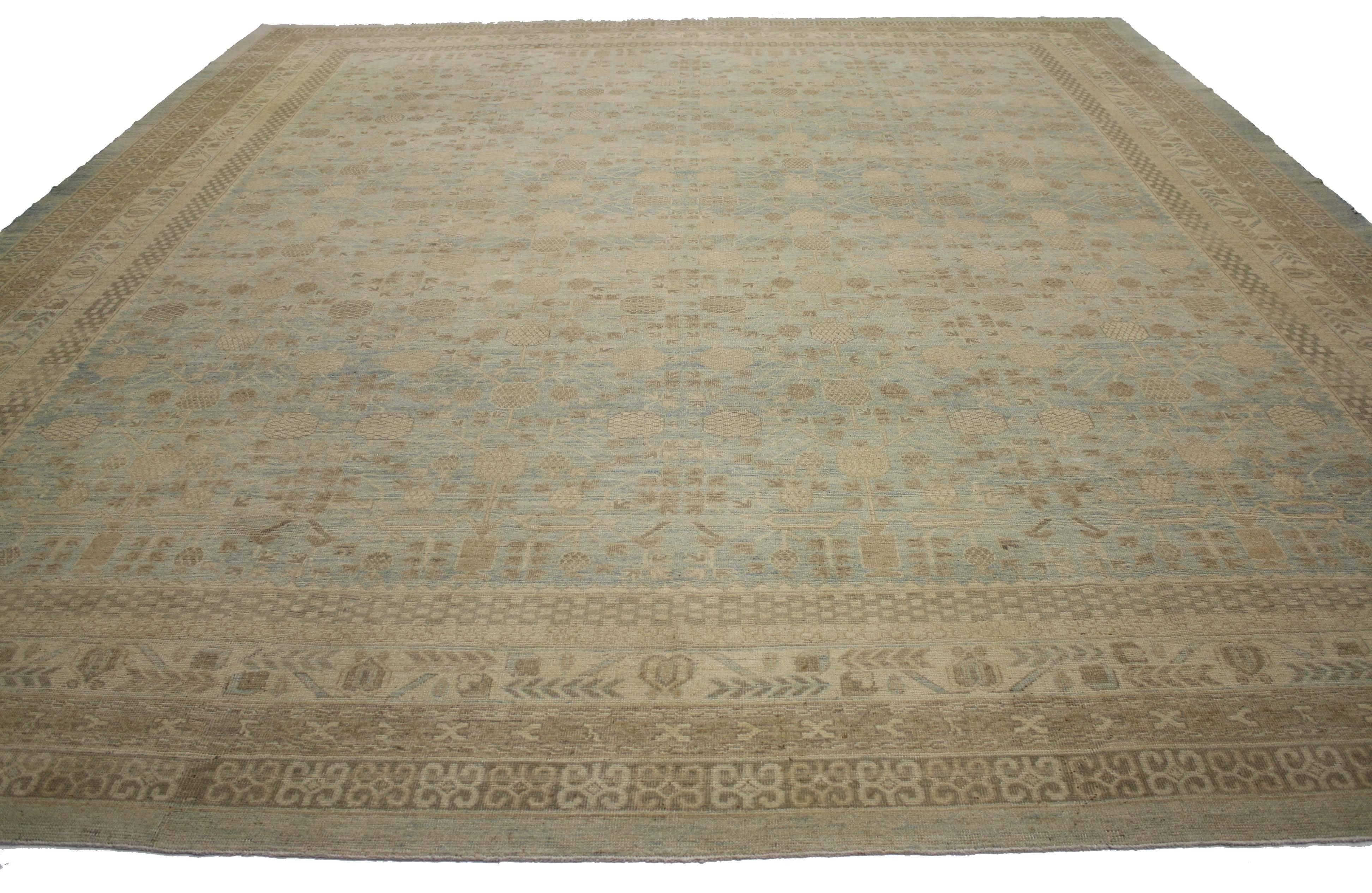 76621 new transitional oversize rug with khotan pomegranate design 12'00 x 14'06. This transitional oversize rug features a Khotan pomegranate design. Providing an element of comfort, artistic statement and functional versatility, this Khotan style