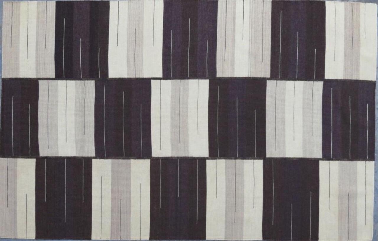Beautiful new Kilim with geometrical tribal design and light colors, entirely handwoven with wool on cotton foundation.