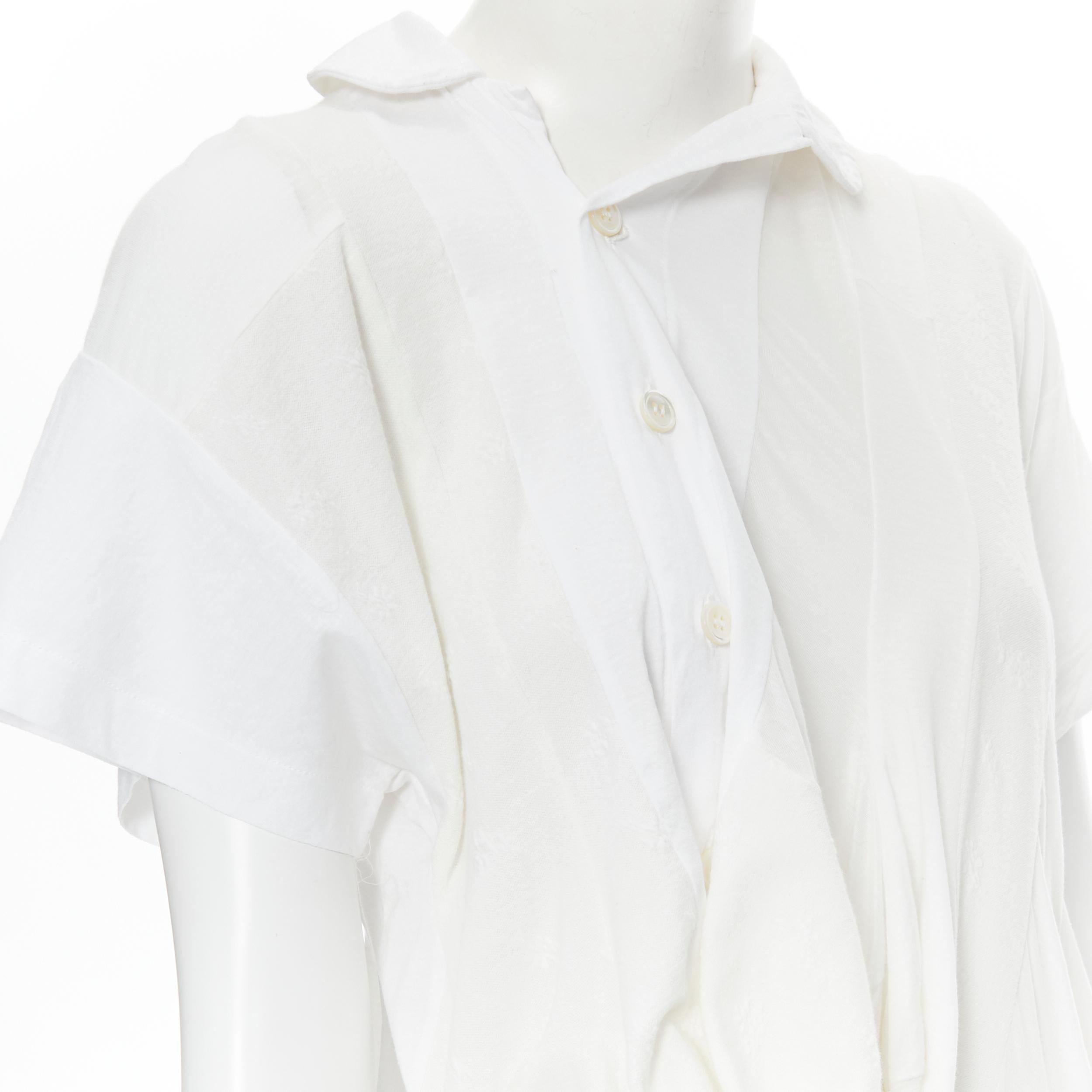 new TRICOT COMME DES GARCONS 2013 white patchwork deconstructed top M 
Reference: CRTI/A00289 
Brand: Comme Des Garcons Tricot 
Designer: Rei Kawakubo 
Material: Cotton 
Color: White 
Pattern: Solid 
Closure: Button 
Extra Detail: Mixed fabric