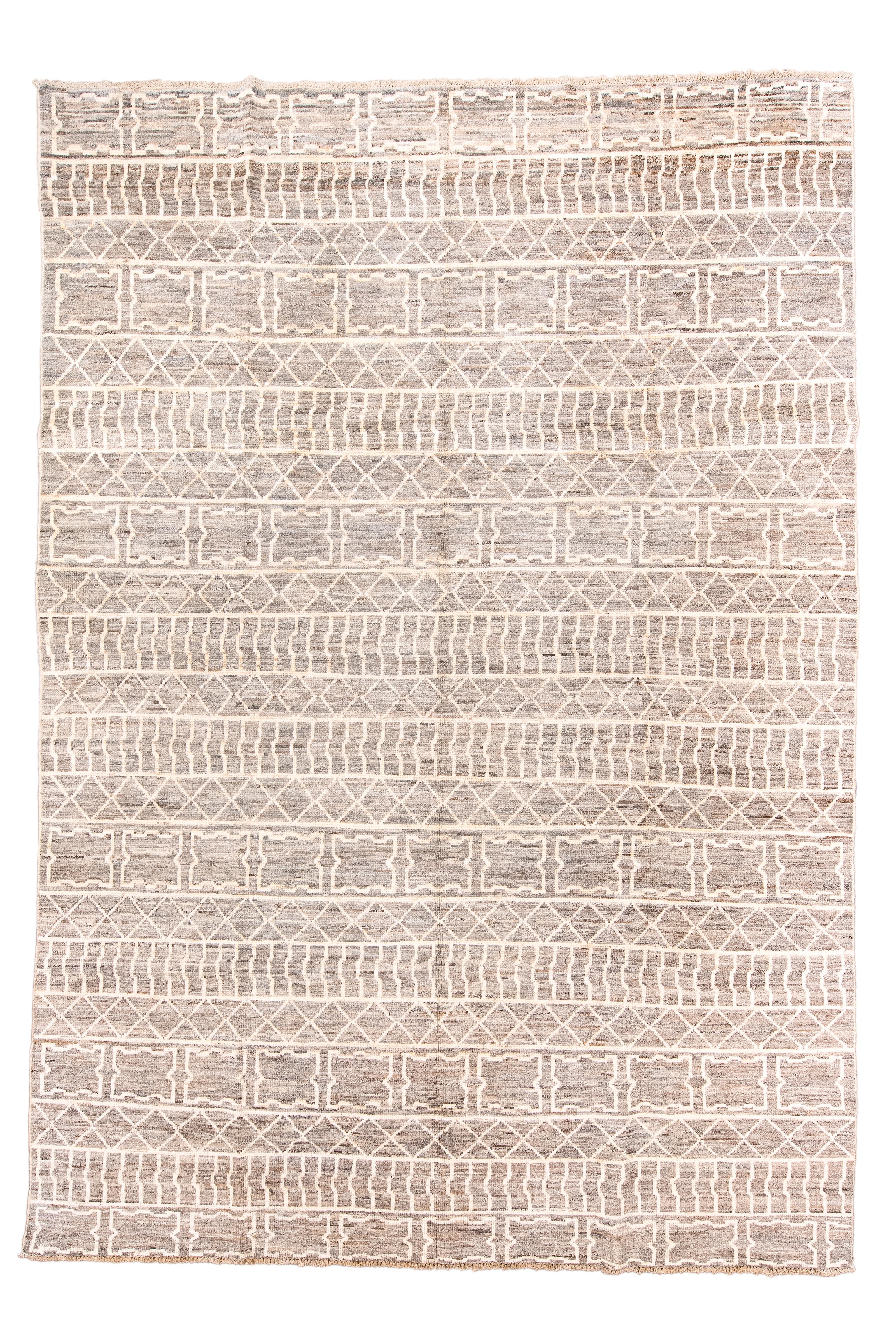 This bitonal abrashed brown and sand village piece shows horizontal pattern bands with diamonds, octogrammes and bent lines. There are no side borders. The rug is in an 'as new' condition.

Rug size
8'6x12'3