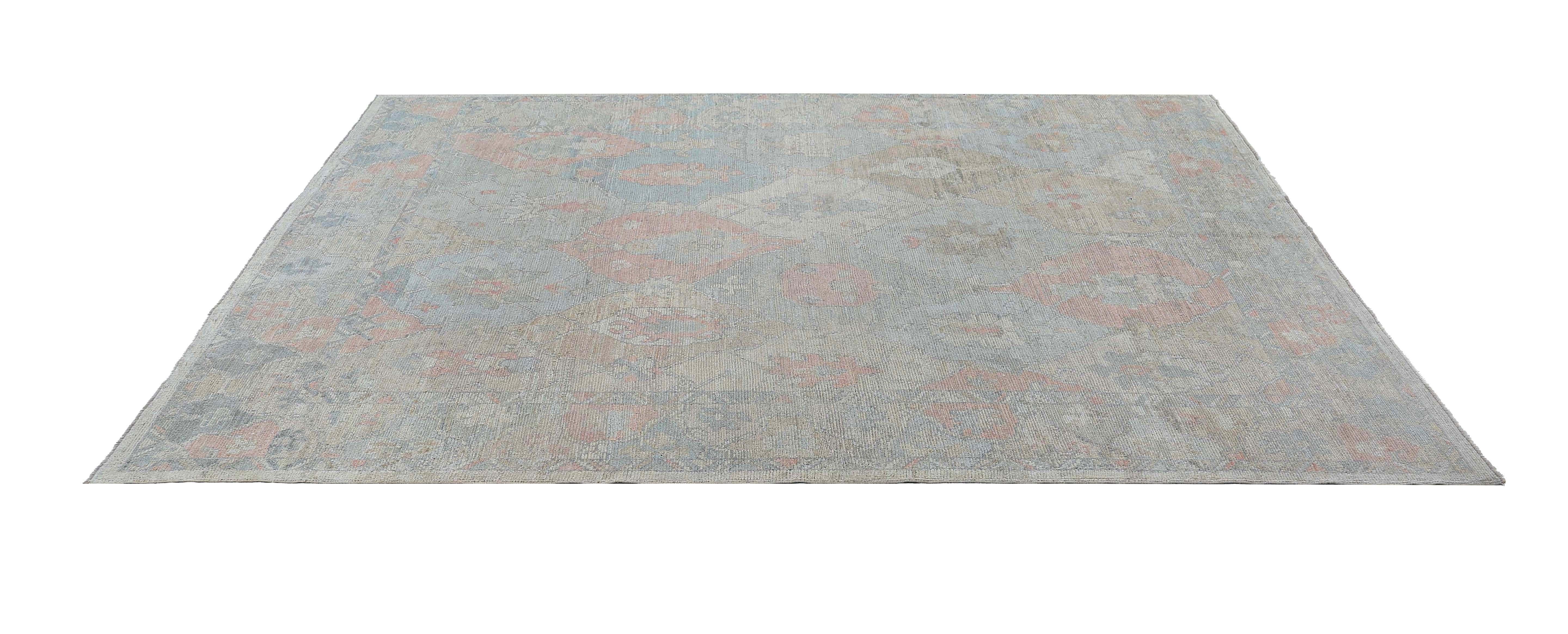 Add a touch of elegance and charm to your home decor with this beautiful Turkish Oushak rug. The rug measures 8'0