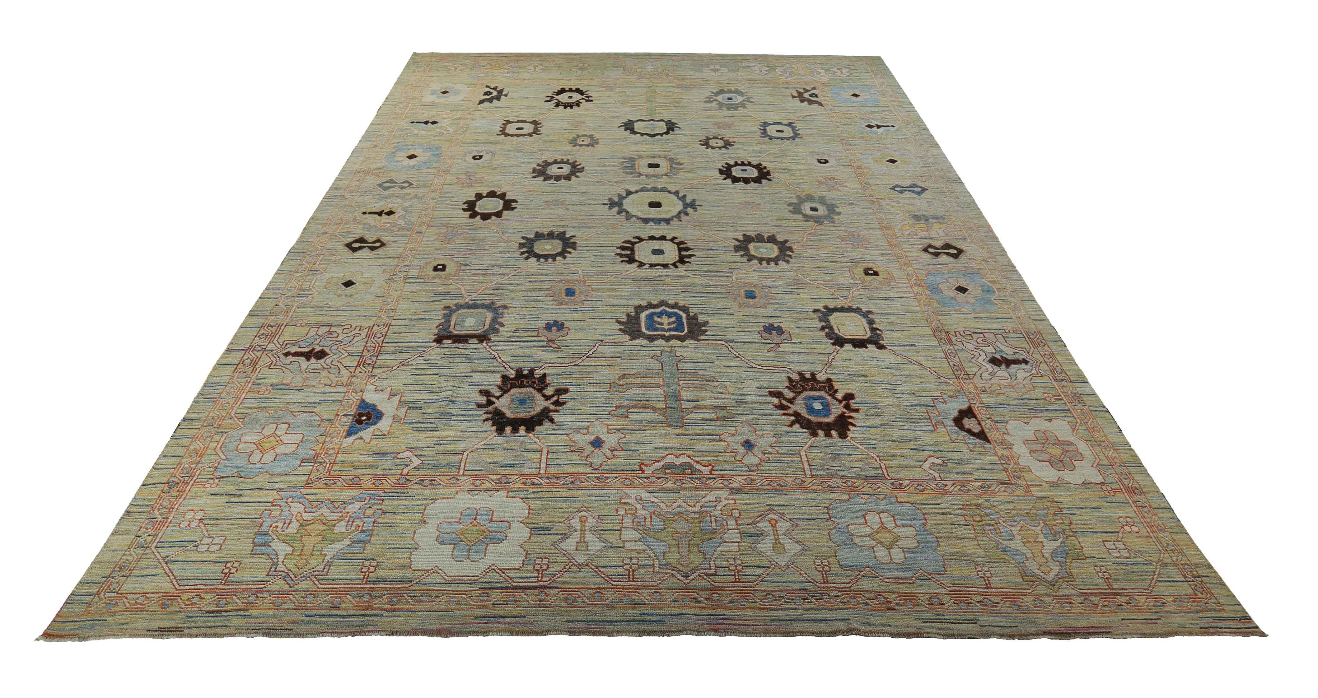 New Turkish rug made of handwoven sheep’s wool of the finest quality. It’s colored with organic vegetable dyes that are certified safe for humans and pets alike. It features brown and blue floral heads on a yellow field. Flower patterns are commonly