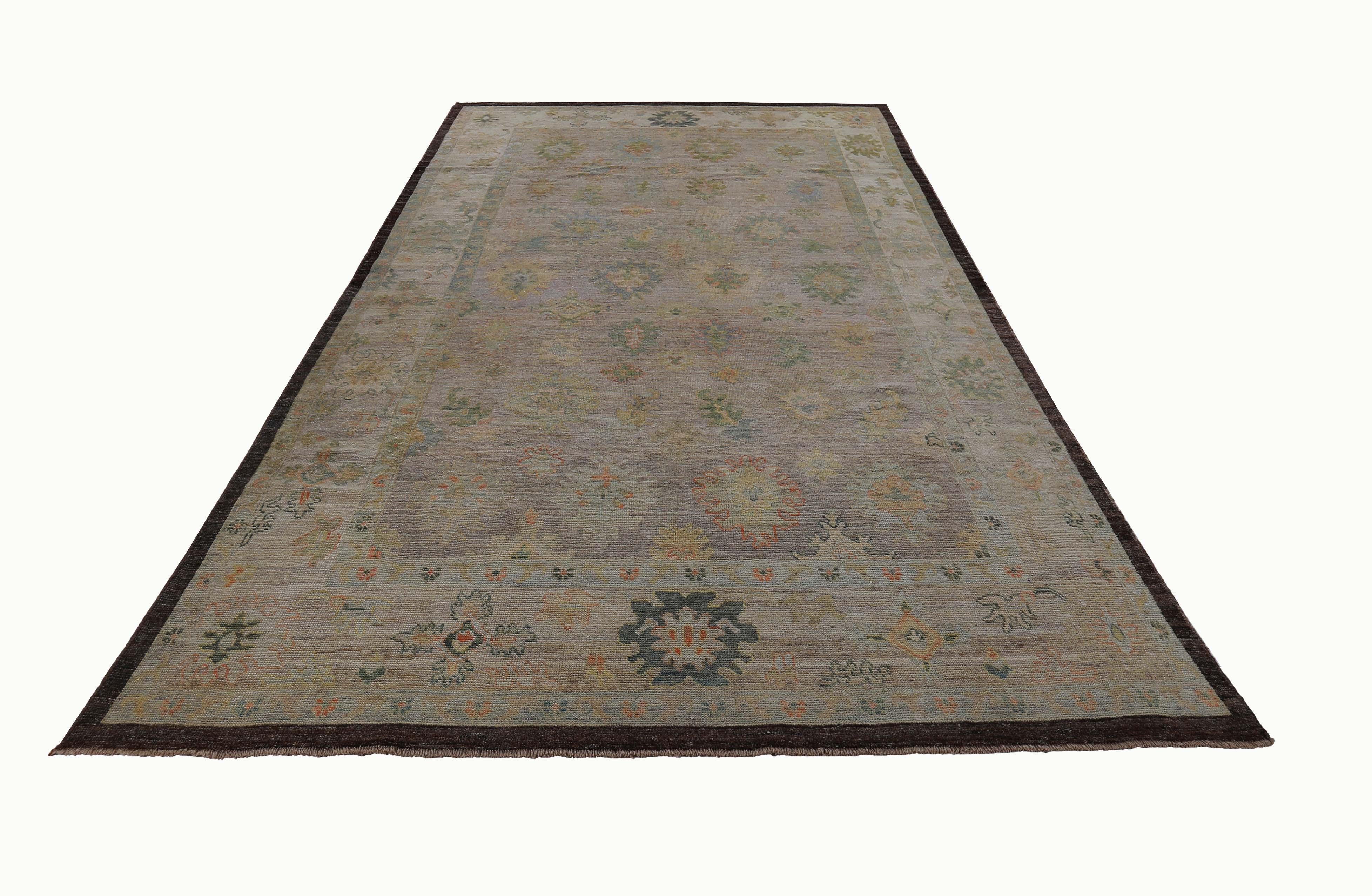 New Turkish rug made of handwoven sheep’s wool of the finest quality. It’s colored with organic vegetable dyes that are certified safe for humans and pets alike. It features floral details in blue and green over a brown field. Flower patterns are