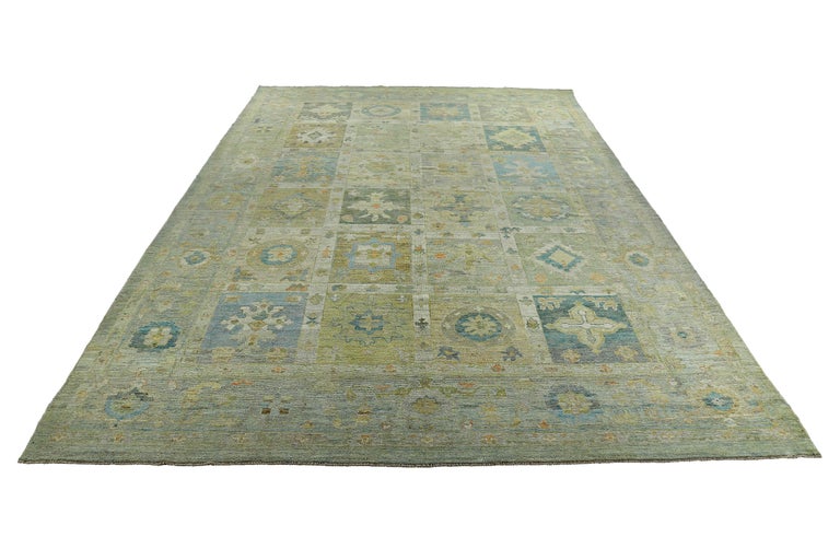 New Turkish Oushak Rug with Blue and Yellow Floral Design on a Green Field For Sale at 1stDibs