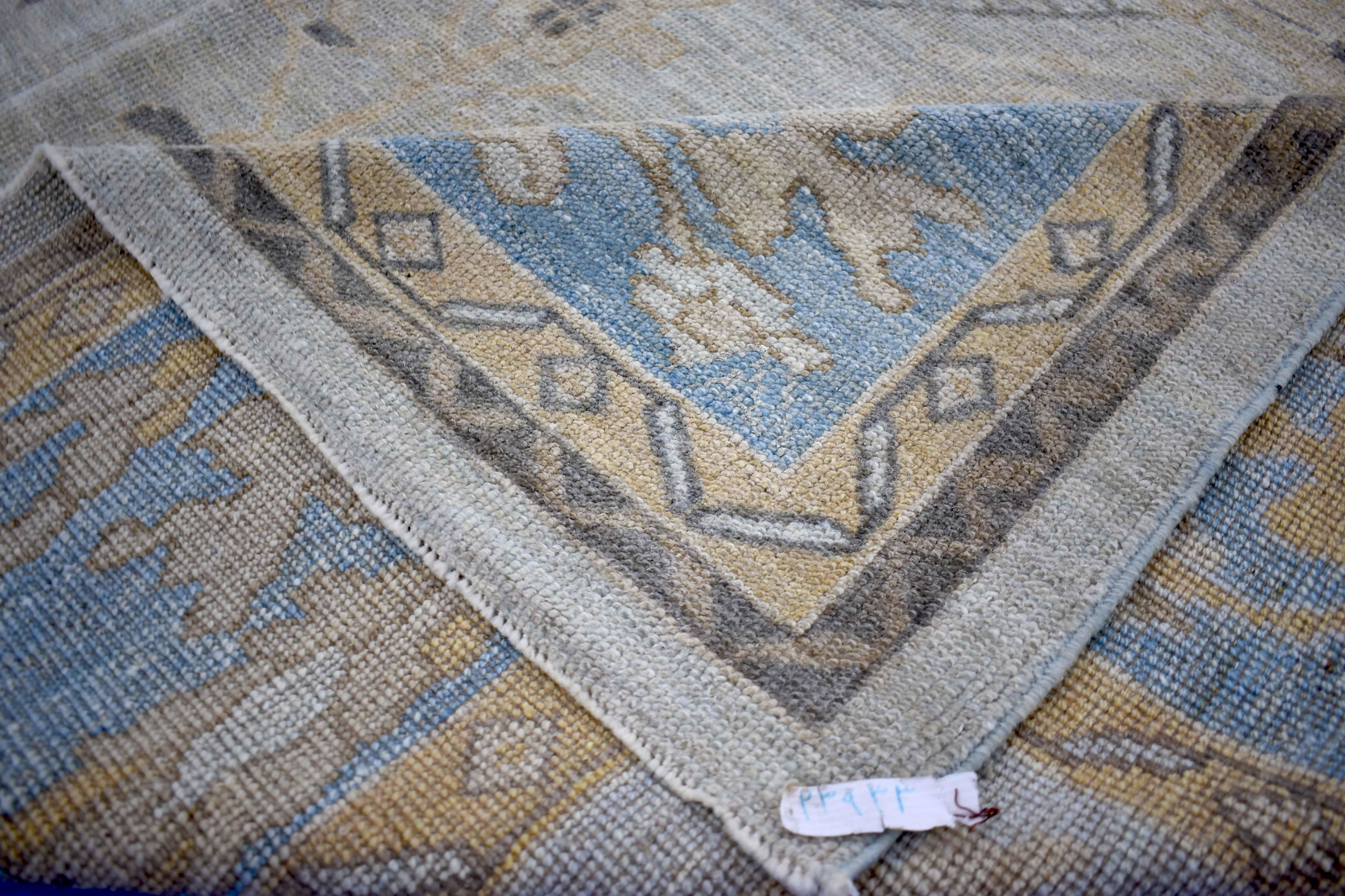 New Turkish Oushak Rug with Gray and Beige Floral Patterns on Blue Field In New Condition For Sale In Dallas, TX