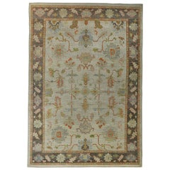 New Turkish Oushak Rug with Green and Red Floral Details on Ivory Field