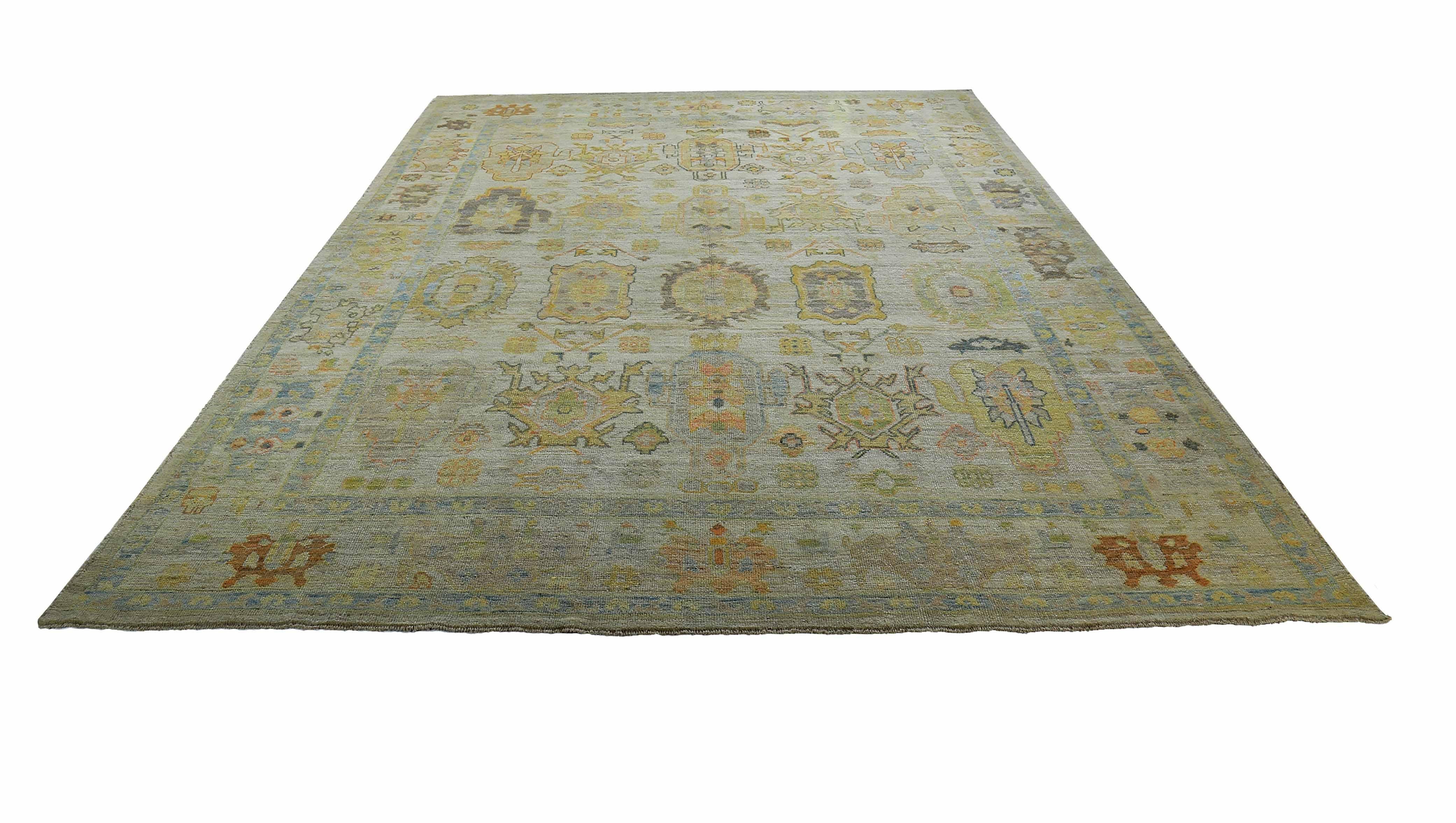 New Turkish rug made of handwoven sheep’s wool of the finest quality. It’s colored with organic vegetable dyes that are certified safe for humans and pets alike. It features yellow and green floral details on an elegant brown field. Flower patterns