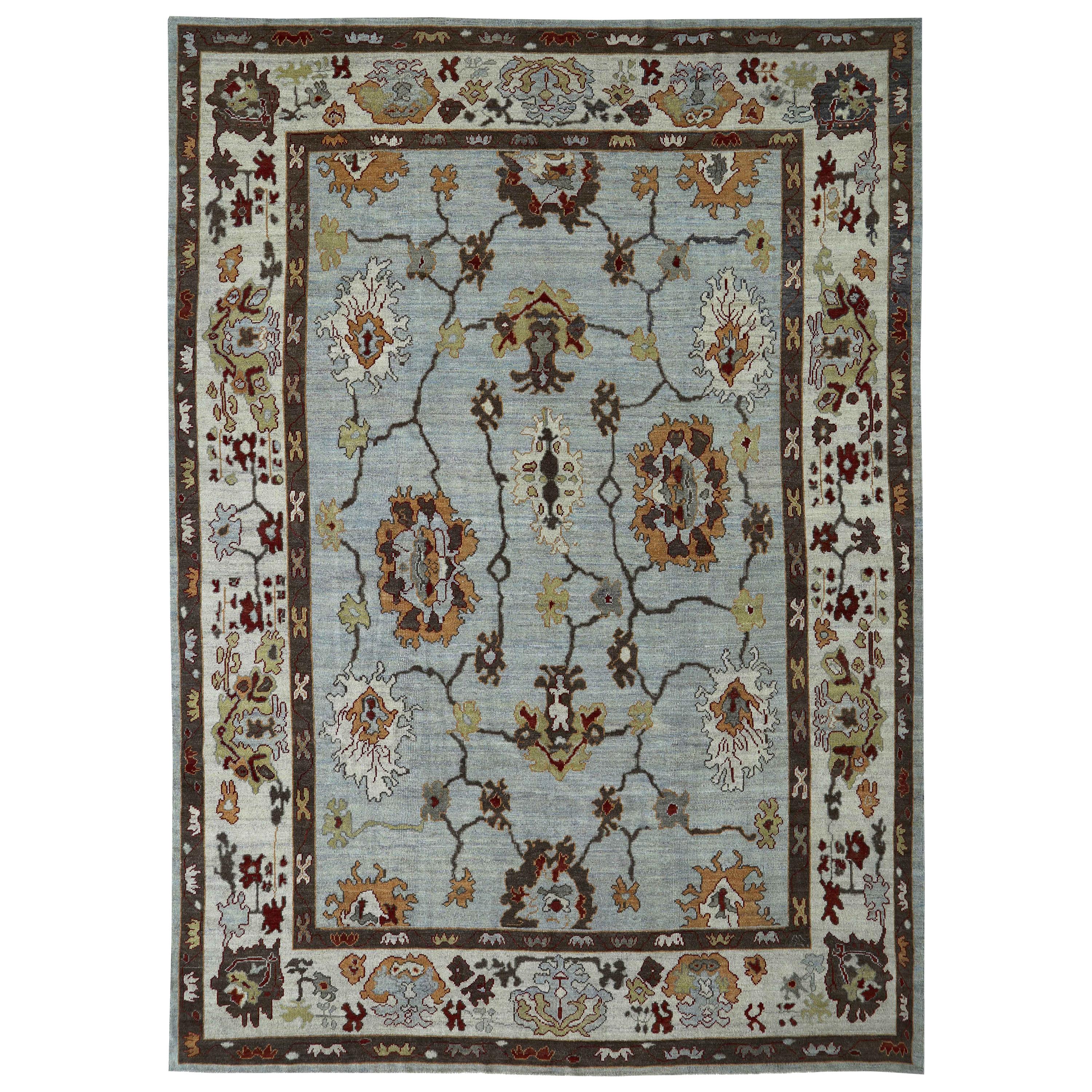 New Turkish Oushak Rug with Ivory and Brown Floral Details on Gray Field For Sale