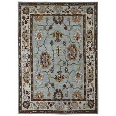 New Turkish Oushak Rug with Ivory and Brown Floral Details on Gray Field