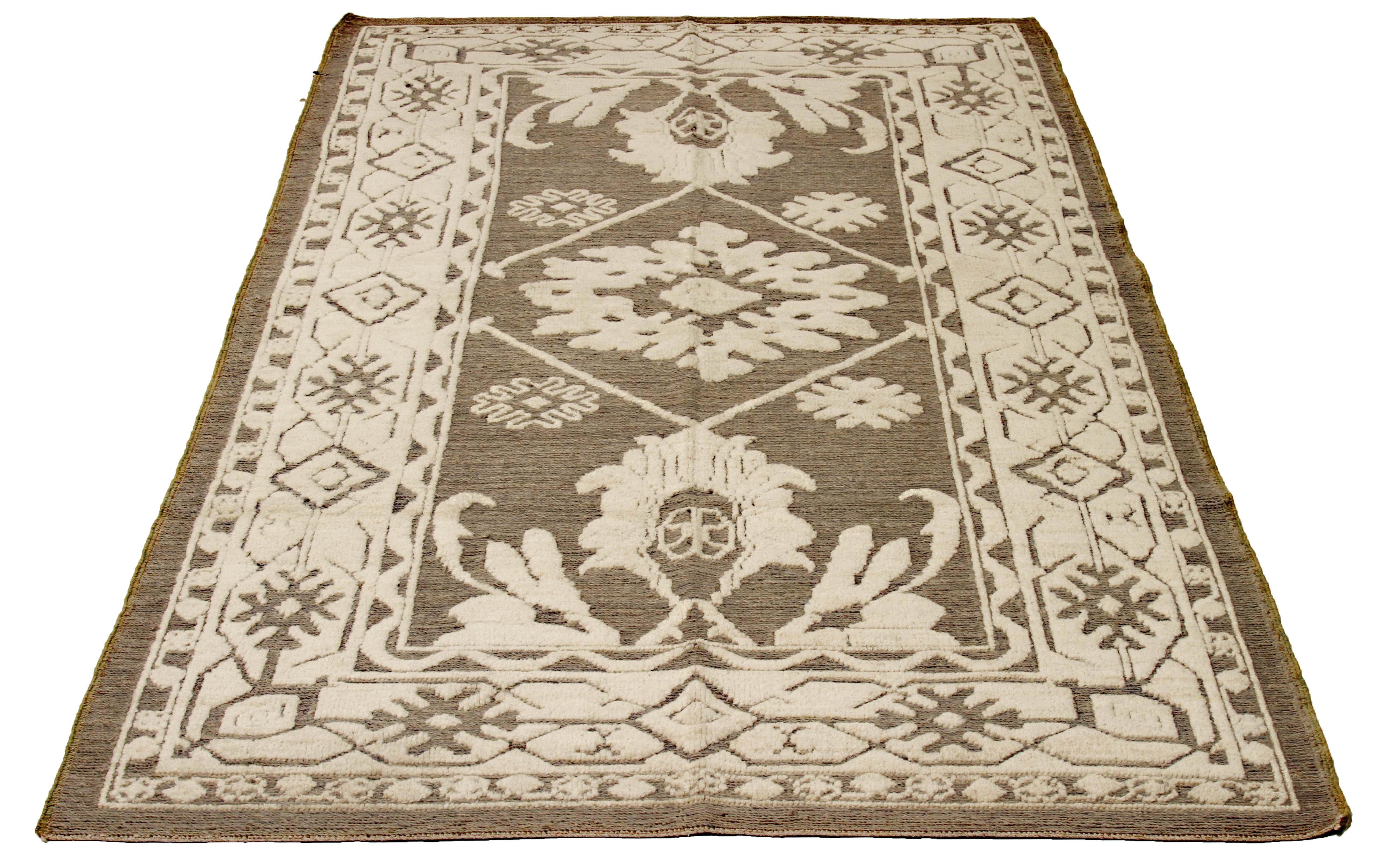 New Turkish runner rug made of handwoven sheep’s wool of the finest quality. It’s colored with organic vegetable dyes that are certified safe for humans and pets alike. It features rows of botanical details all-over associated with Oushak weaving