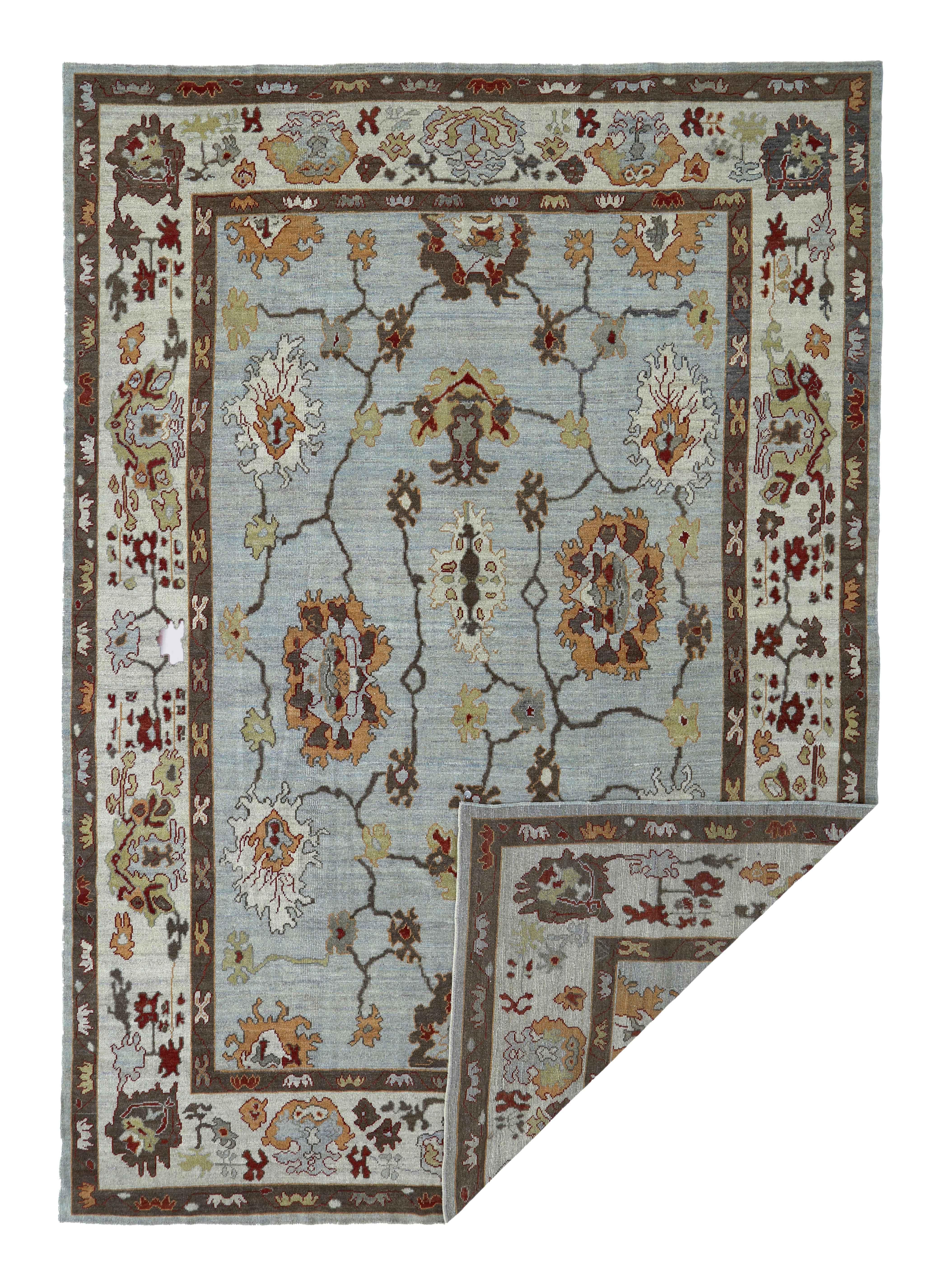 Wool New Turkish Oushak Rug with Ivory and Brown Floral Details on Gray Field For Sale