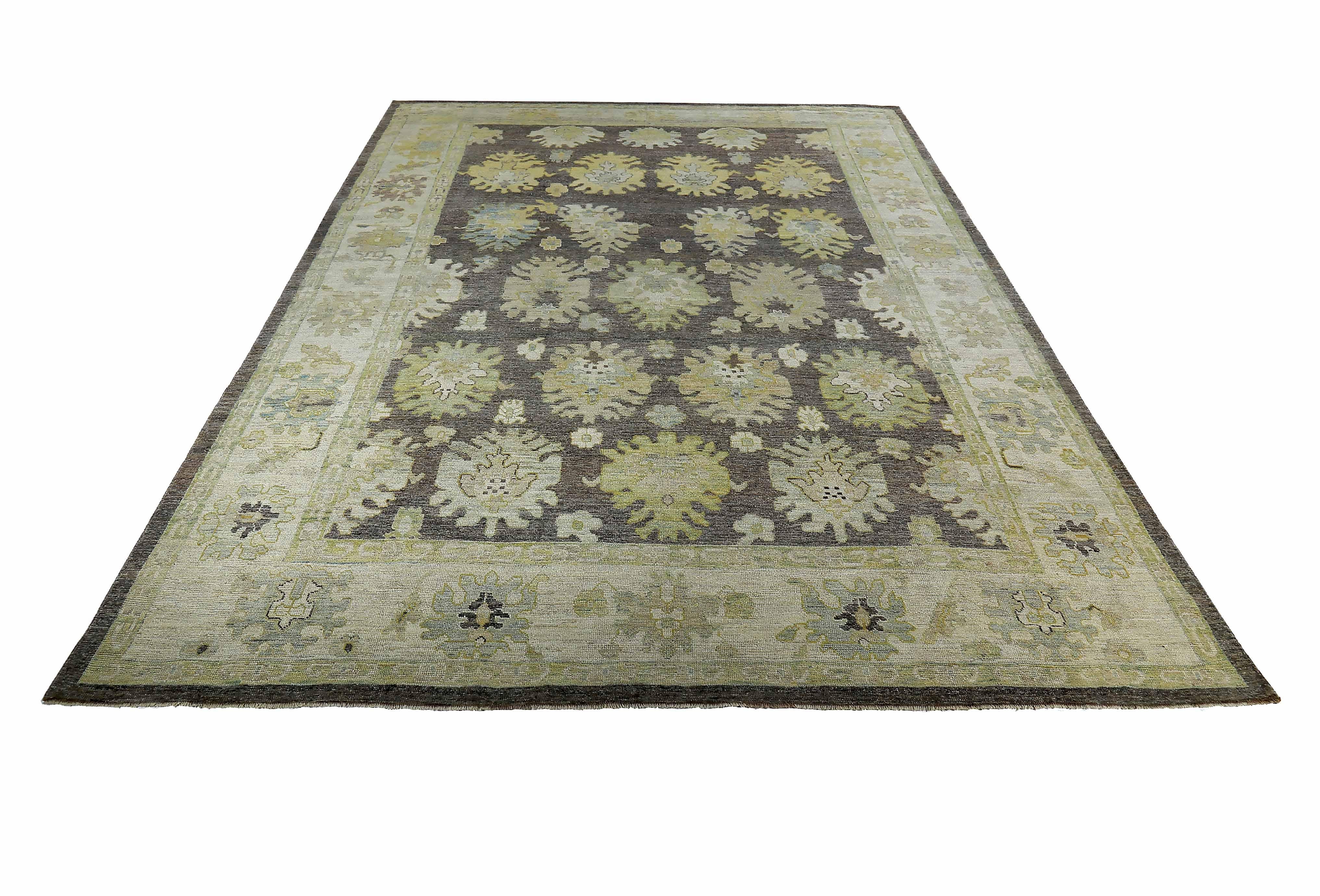 New Turkish rug made of handwoven sheep’s wool of the finest quality. It’s colored with organic vegetable dyes that are certified safe for humans and pets alike. It features ivory and gold flower heads adorning a rich brown field. Flower patterns
