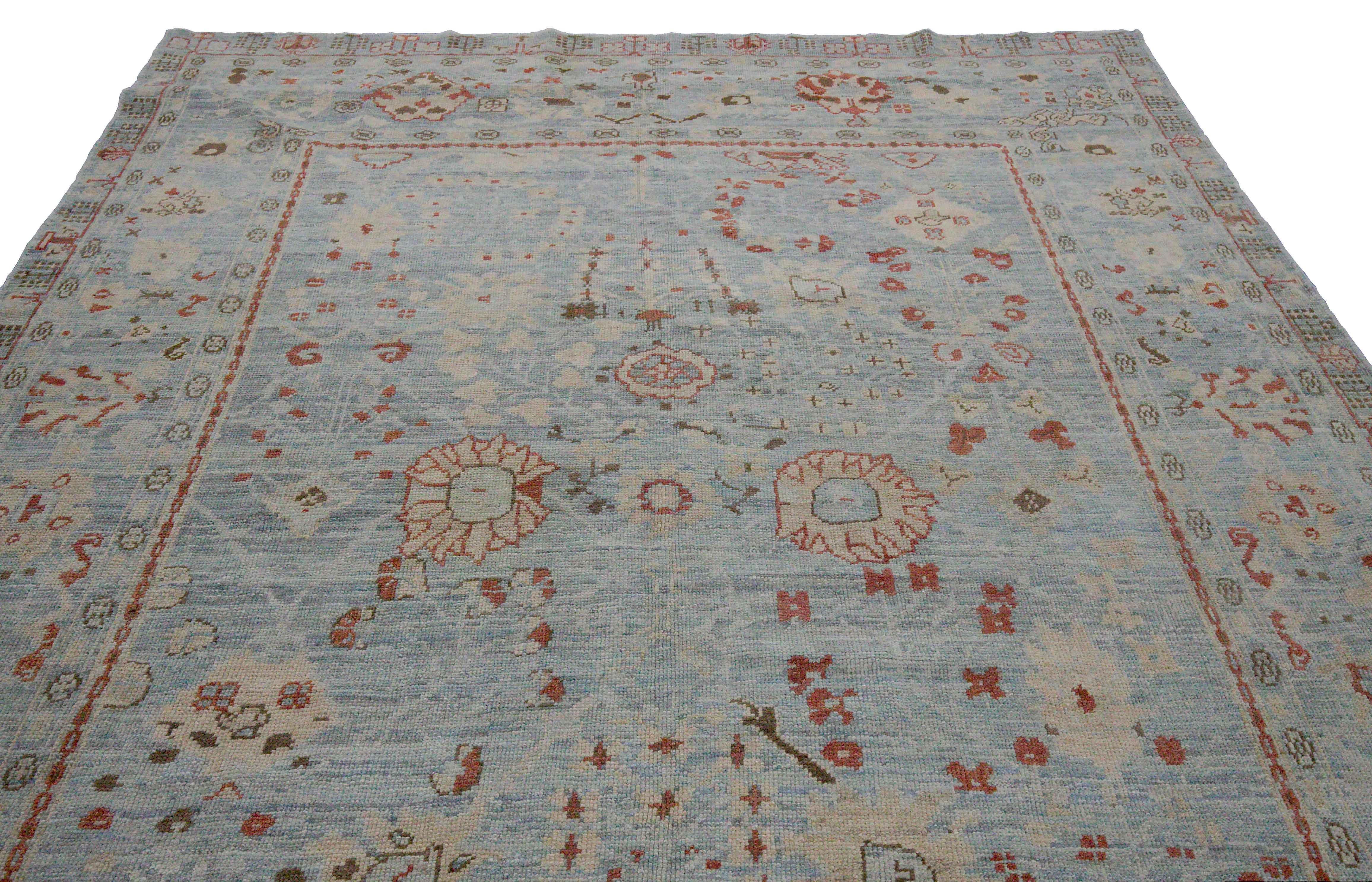 New Turkish Oushak Rug with Ivory and Red Floral Details on Blue Field In New Condition For Sale In Dallas, TX