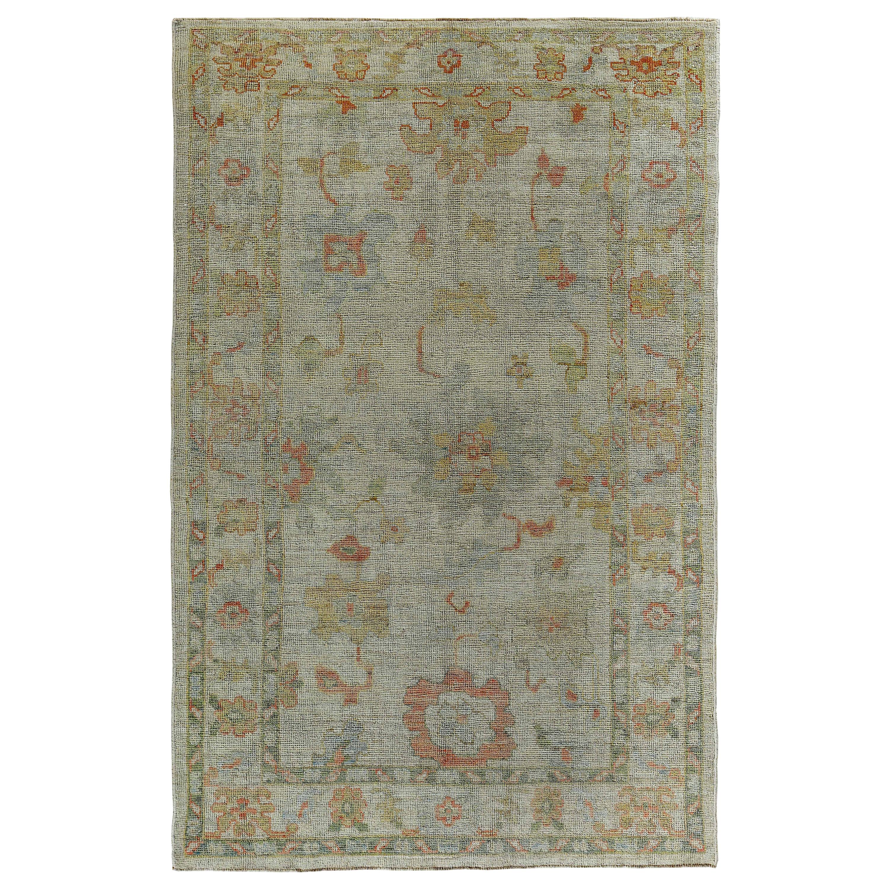 New Turkish Oushak Rug with Pink and Gold Flower Heads on Ivory Field For Sale