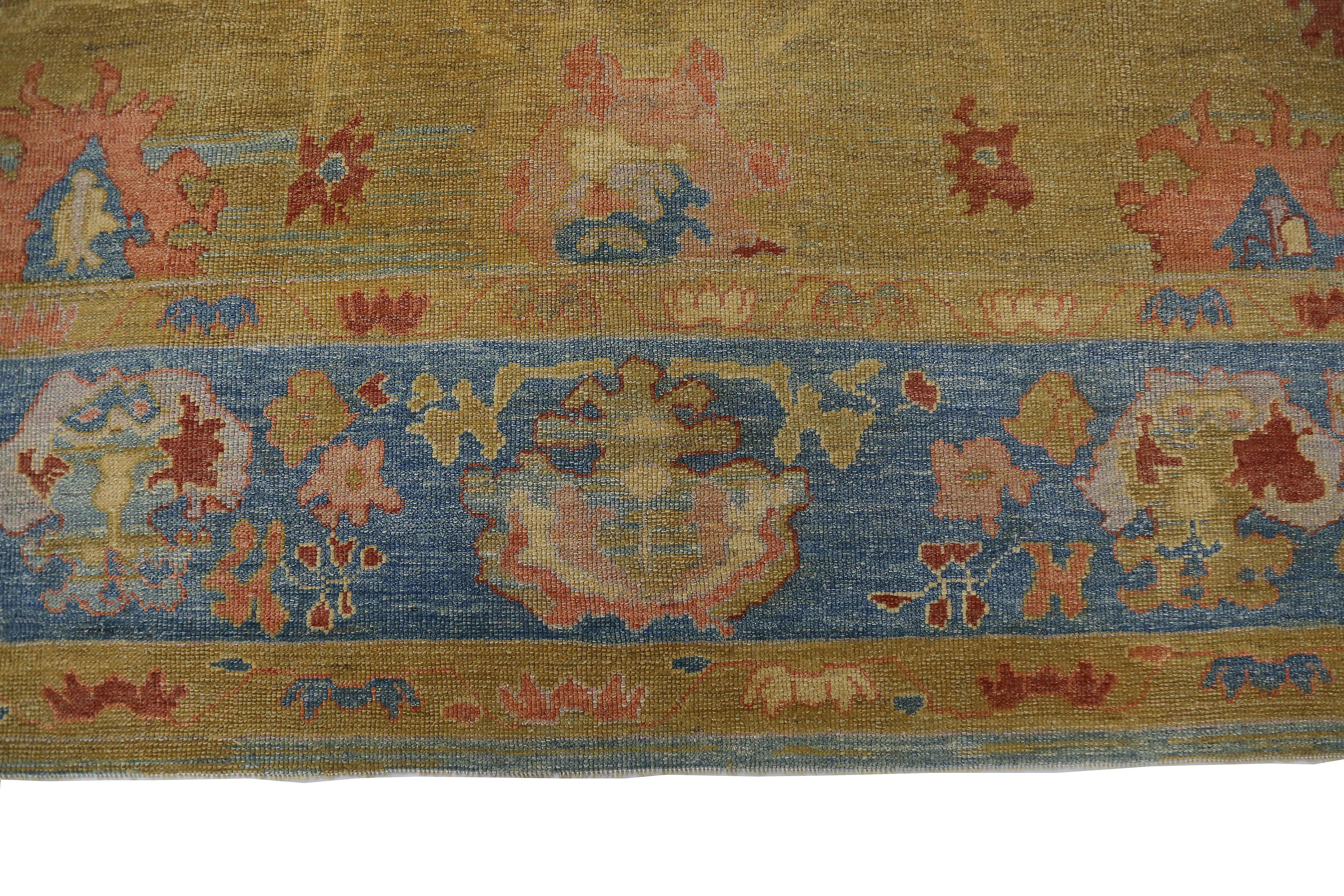 New Turkish rug made of handwoven sheep’s wool of the finest quality. It’s colored with organic vegetable dyes that are certified safe for humans and pets alike. It features floral details in red and blue over a lovely golden field. Flower patterns