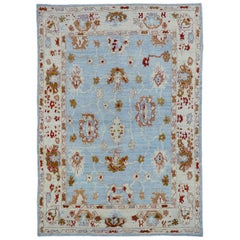 New Turkish Oushak Rug with Red & Gold Floral Details on Ivory Blue Field