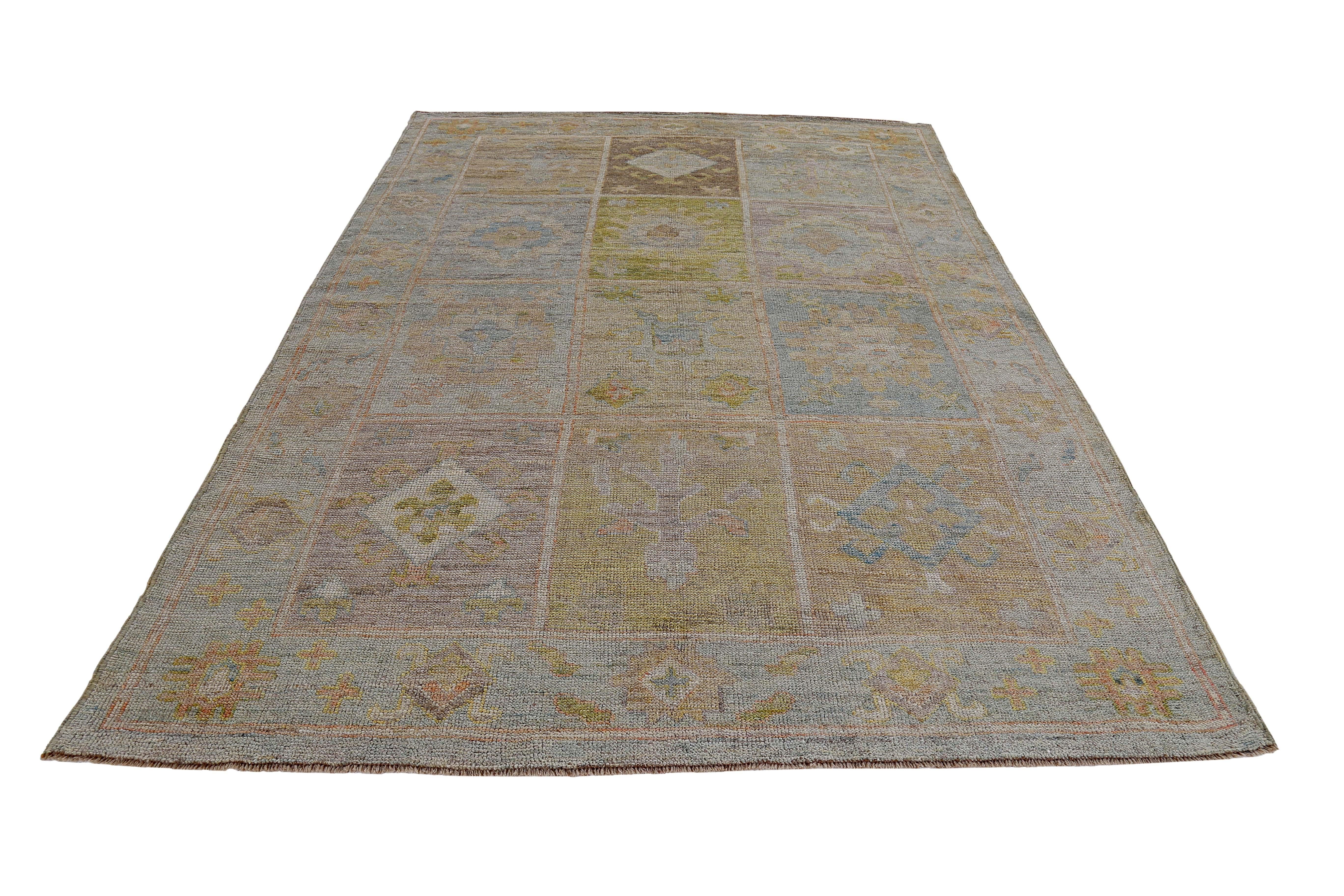 New Turkish rug made of handwoven sheep’s wool of the finest quality. It’s colored with organic vegetable dyes that are certified safe for humans and pets alike. It features floral details in yellow, orange and green over a blue field. Flower