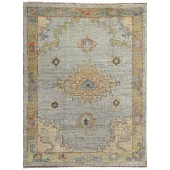 New Turkish Oushak Rug with Yellow, Orange & Green Floral Details on Blue Field