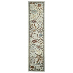 New Turkish Oushak Runner Rug with Blue
Brown Floral Details on Ivory Field New Turkish Oushak Runner Rug with Blue
Brown Floral Details on Ivory Field