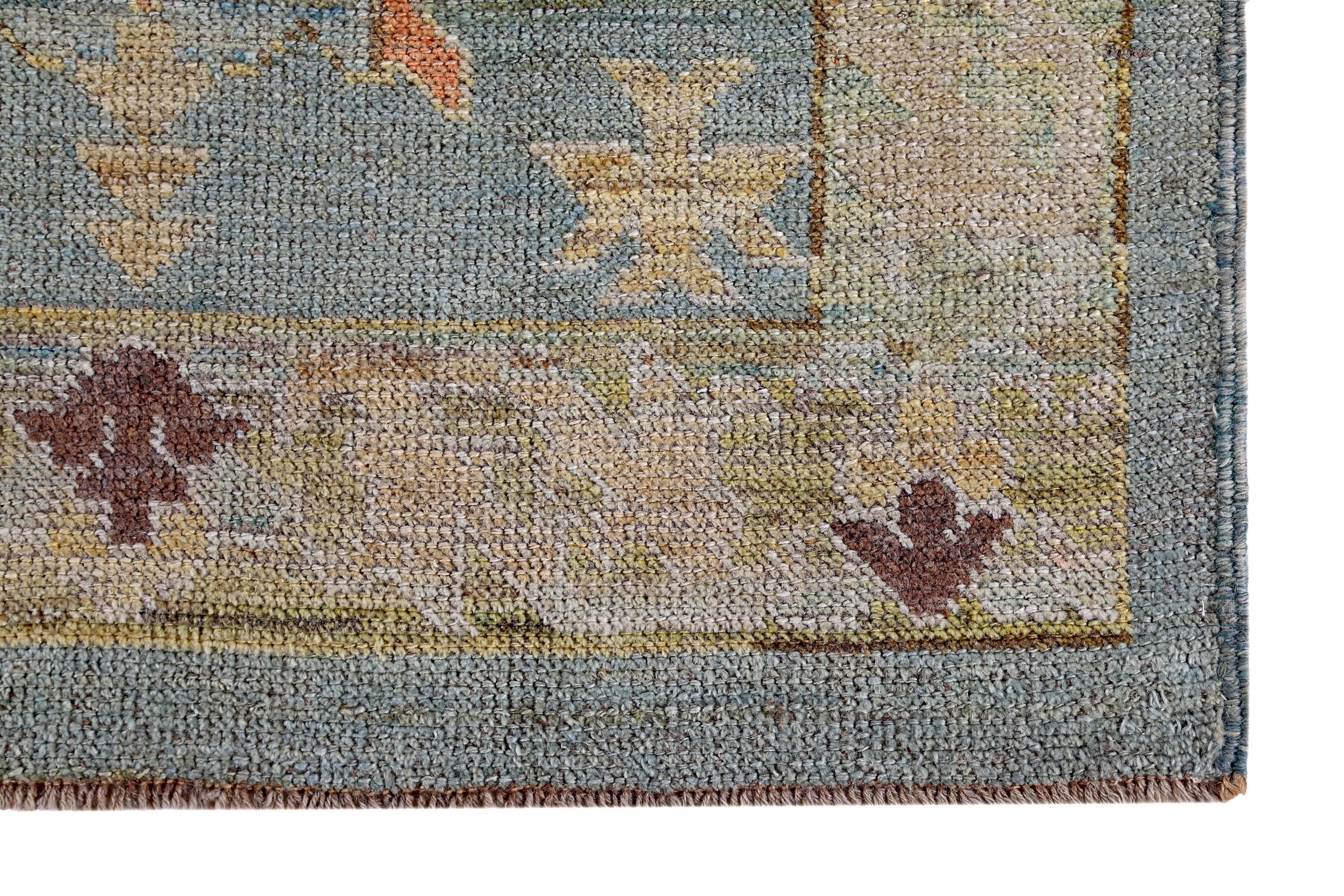 New Turkish Oushak Runner Rug with Brown and Yellow Floral Details on Blue Field In New Condition For Sale In Dallas, TX