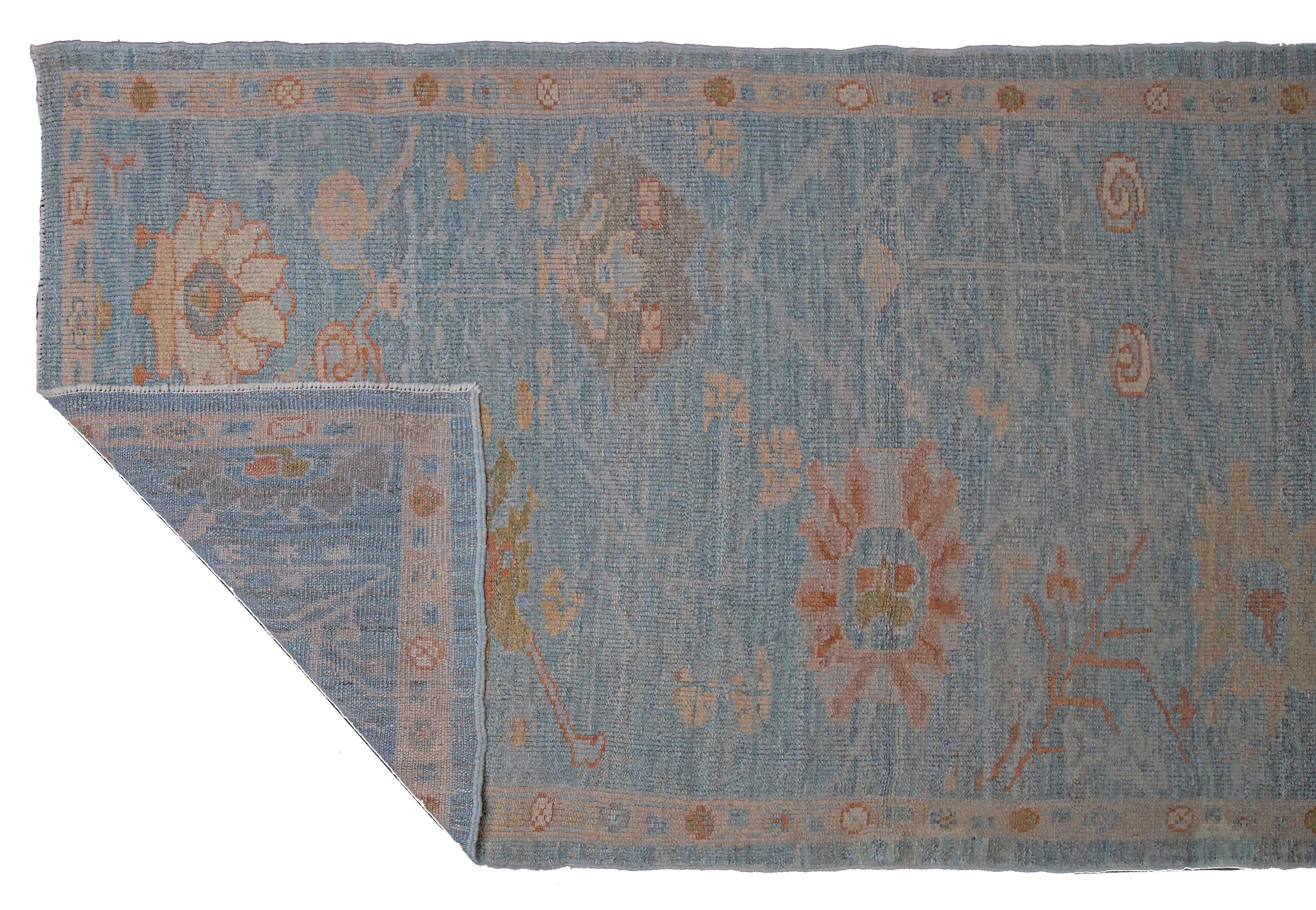 New Turkish Oushak Runner Rug with Green and Pink Floral Details on Blue Field In New Condition For Sale In Dallas, TX