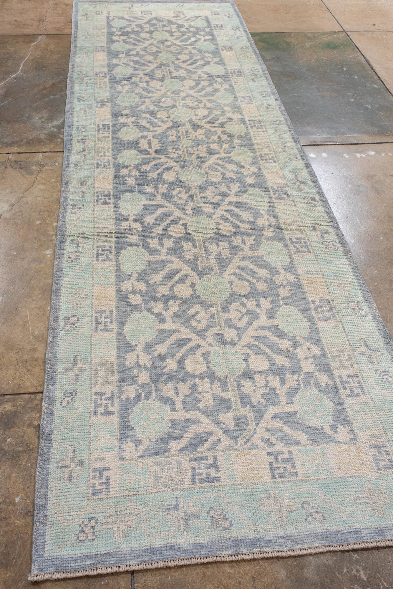 Hand-Knotted New Turkish Oushak Runner with a Khotan Design For Sale