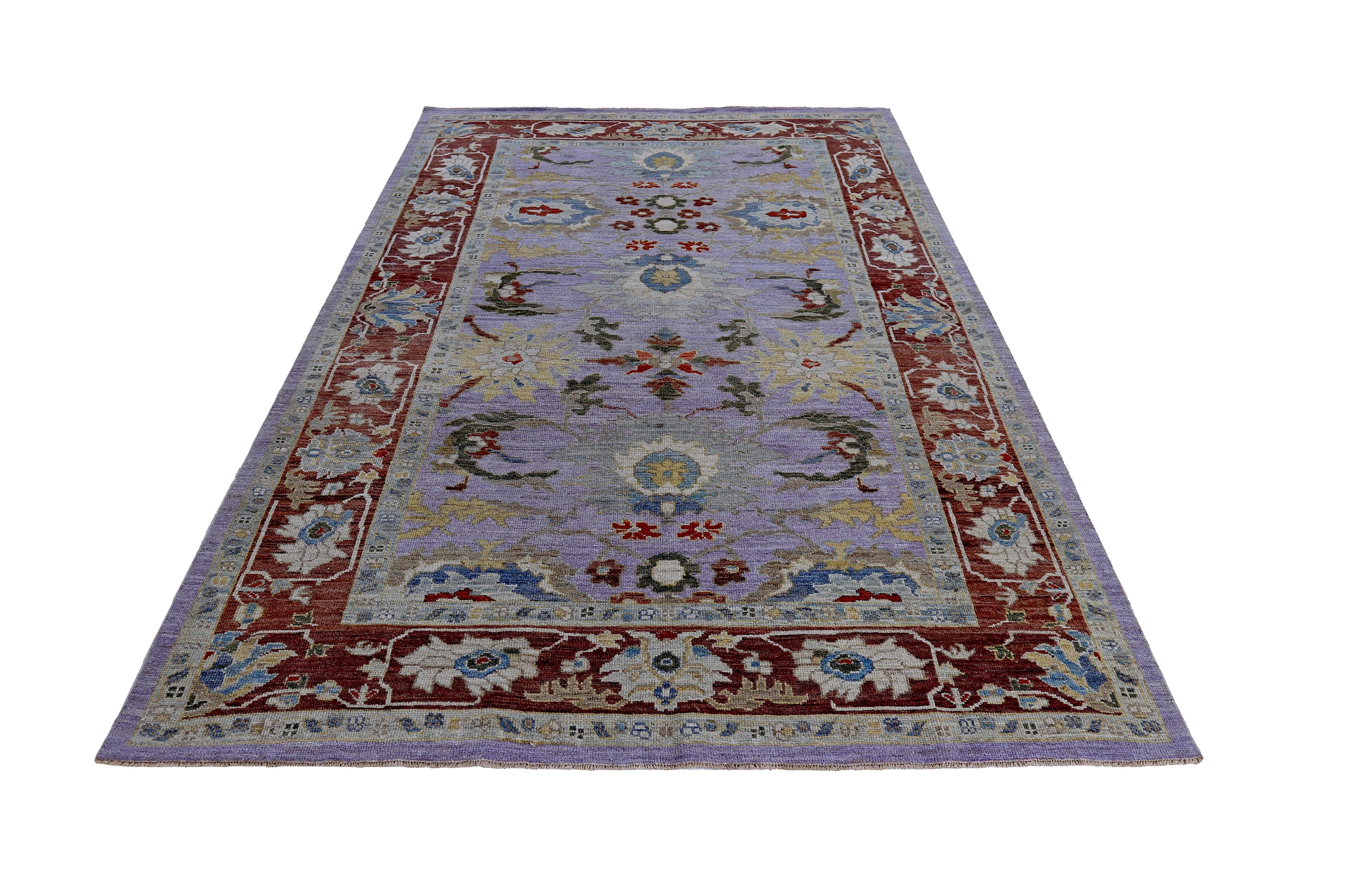 New handmade Turkish area rug from high quality sheep’s wool and colored with eco-friendly vegetable dyes that are proven safe for humans and pets alike. It’s a Classic Sultanabad design showcasing a regal purple field with prominent Herati flower