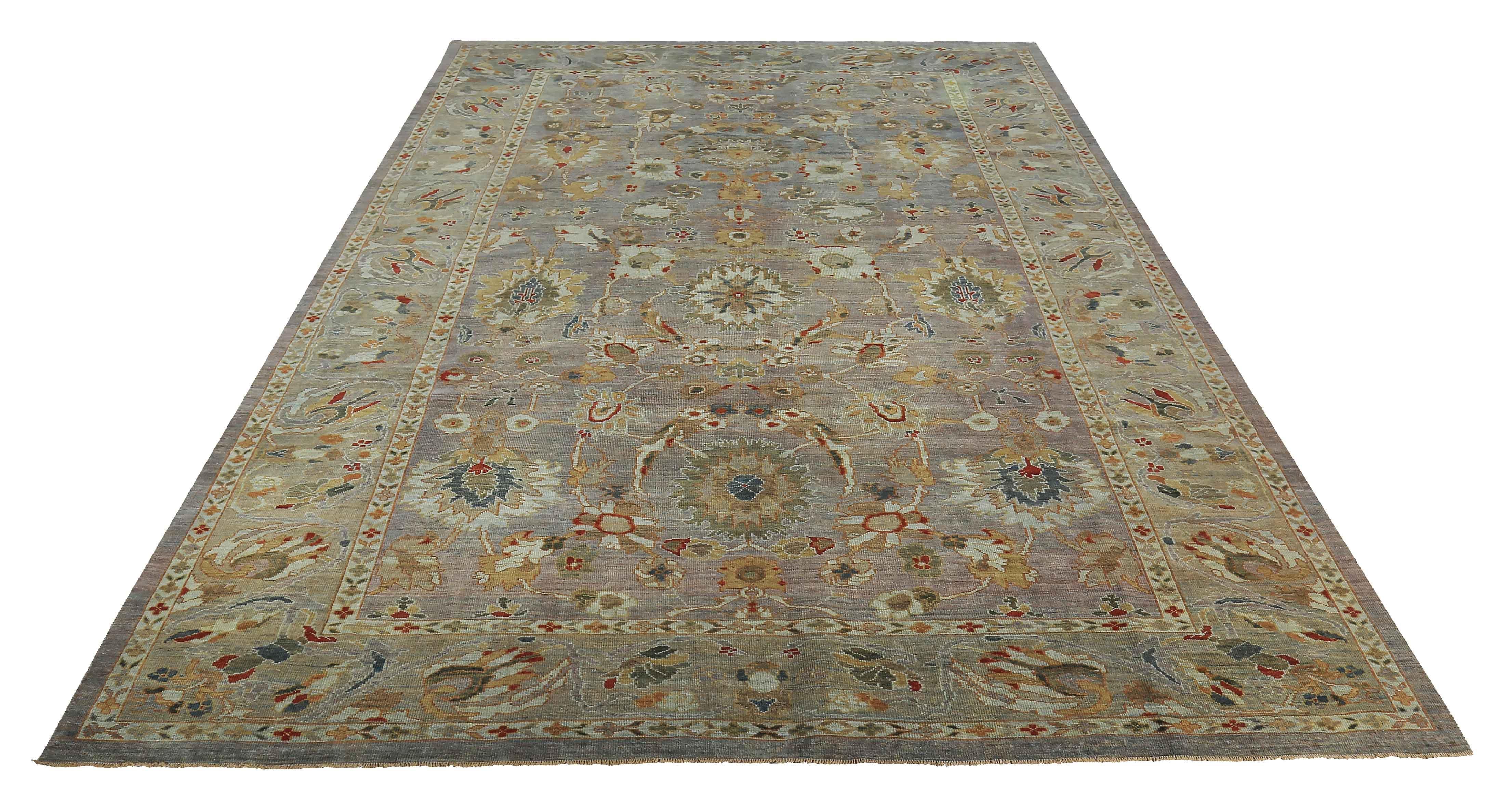 New handmade Turkish area rug from high quality sheep’s wool and colored with eco-friendly vegetable dyes that are proven safe for humans and pets alike. It’s a classic Sultanabad design showcasing a regal gray field with prominent Herati flower