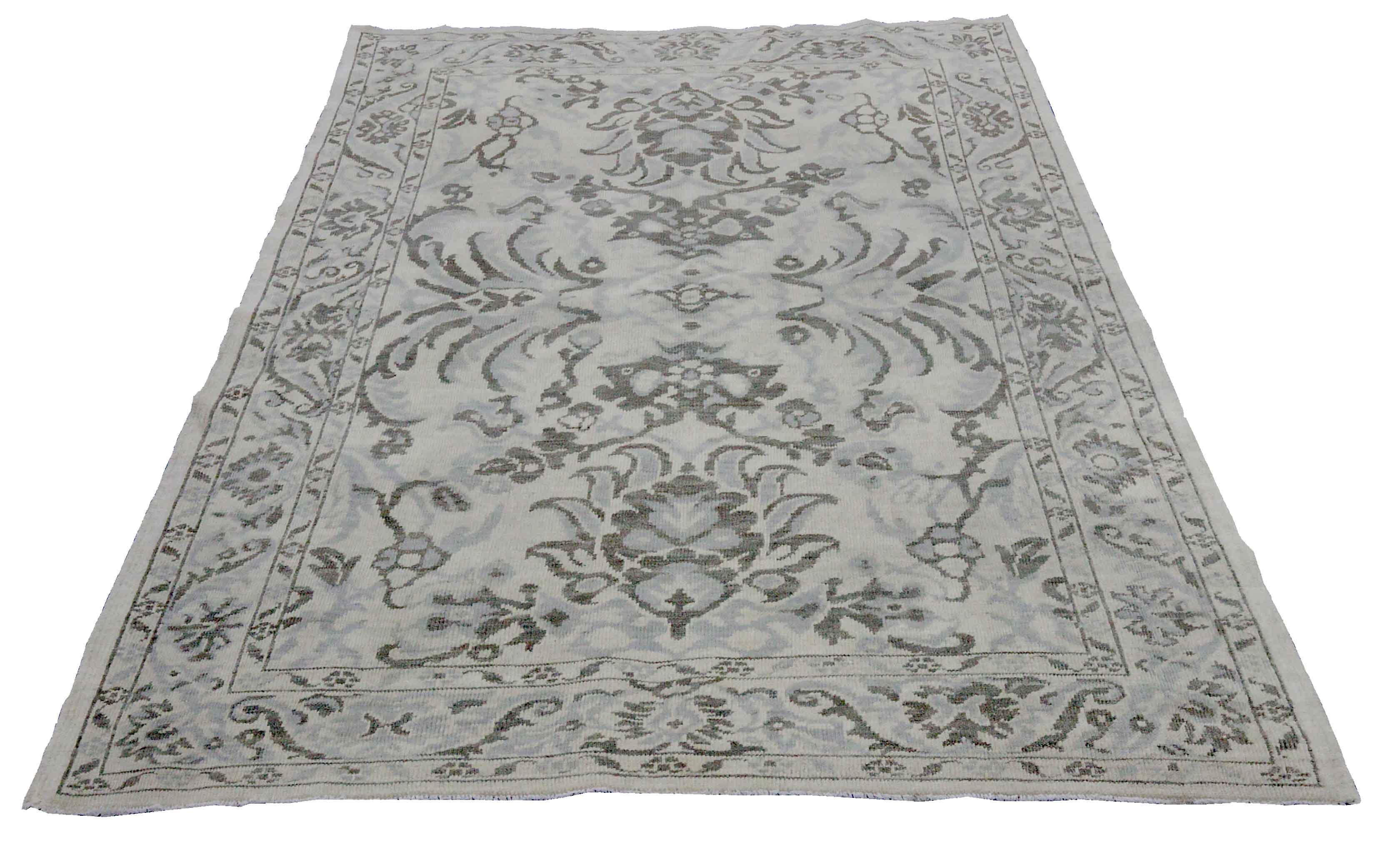 New handmade Turkish area rug from high quality sheep’s wool and colored with eco-friendly vegetable dyes that are proven safe for humans and pets alike. It’s a classic Sultanabad design showcasing a regal ivory field with prominent Herati flower