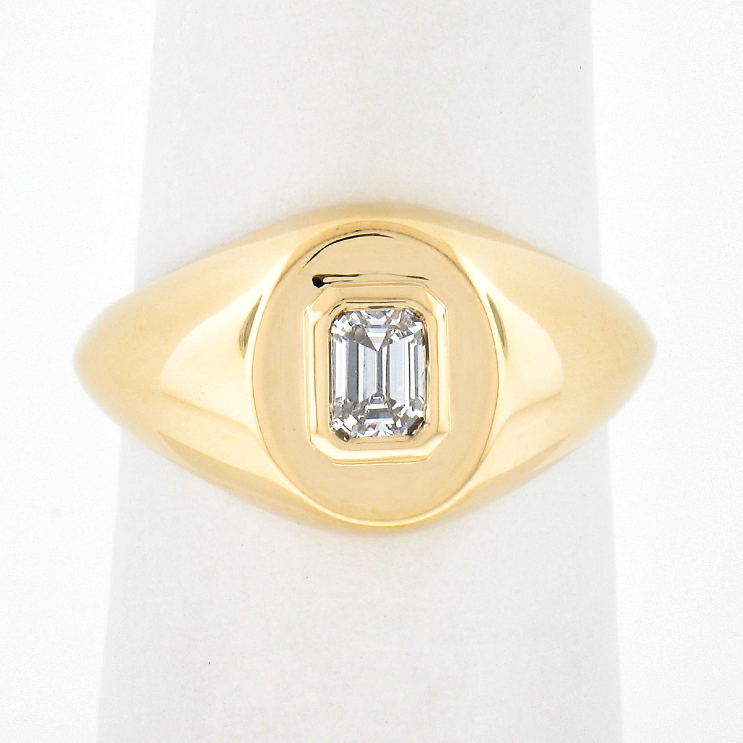 Here we have a simple yet absolutely gorgeous diamond solitaire ring that is newly crafted from solid 14k yellow gold. The solitaire has a beautiful emerald cut and is neatly bezel set at the slightly raised center of the ring, weighing exactly 0.40