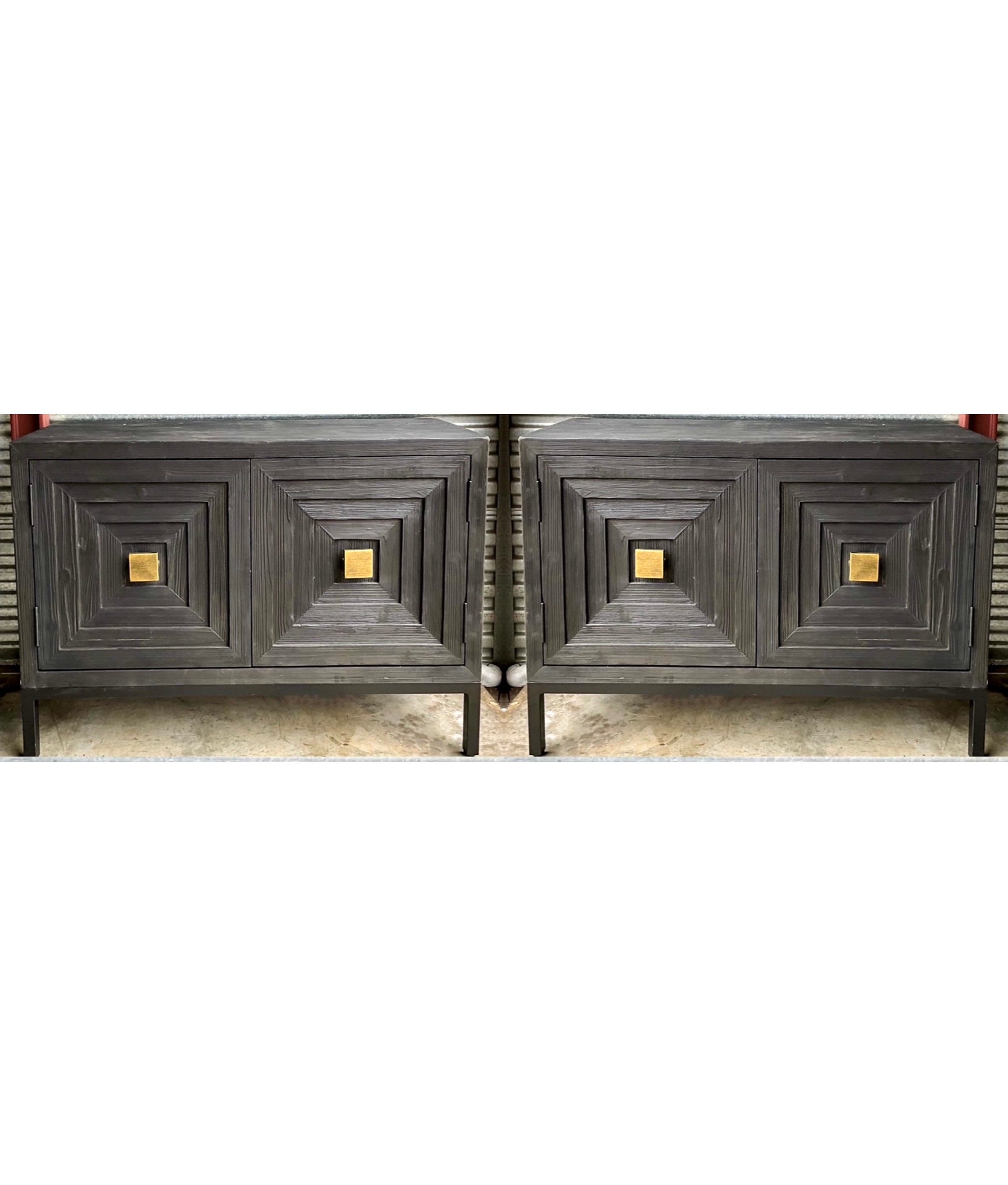 This is a pair of new organic modern cabinets by Uttermost. They have a distressed black finish and gilt metal accents. Original tags.

