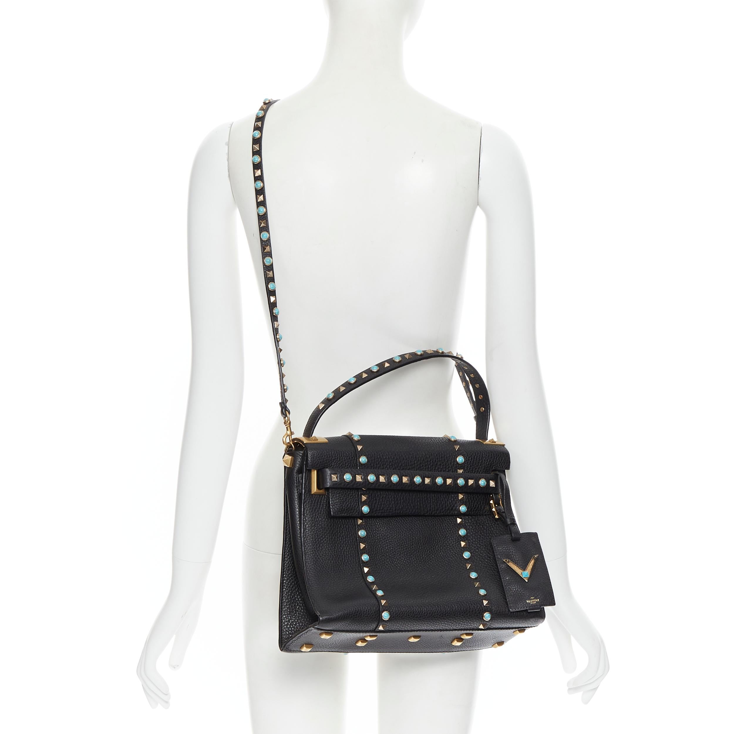 new VALENTINO black pebble leather turquoise stone Rockstud satchel shoulder bag 
Reference: MAWG/A00053 
Brand: Valentino 
Model: Rockstud satchel 
Material: Leather 
Color: Black 
Pattern: Solid 
Closure: Magnetic 
Extra Detail: Turquoise stone