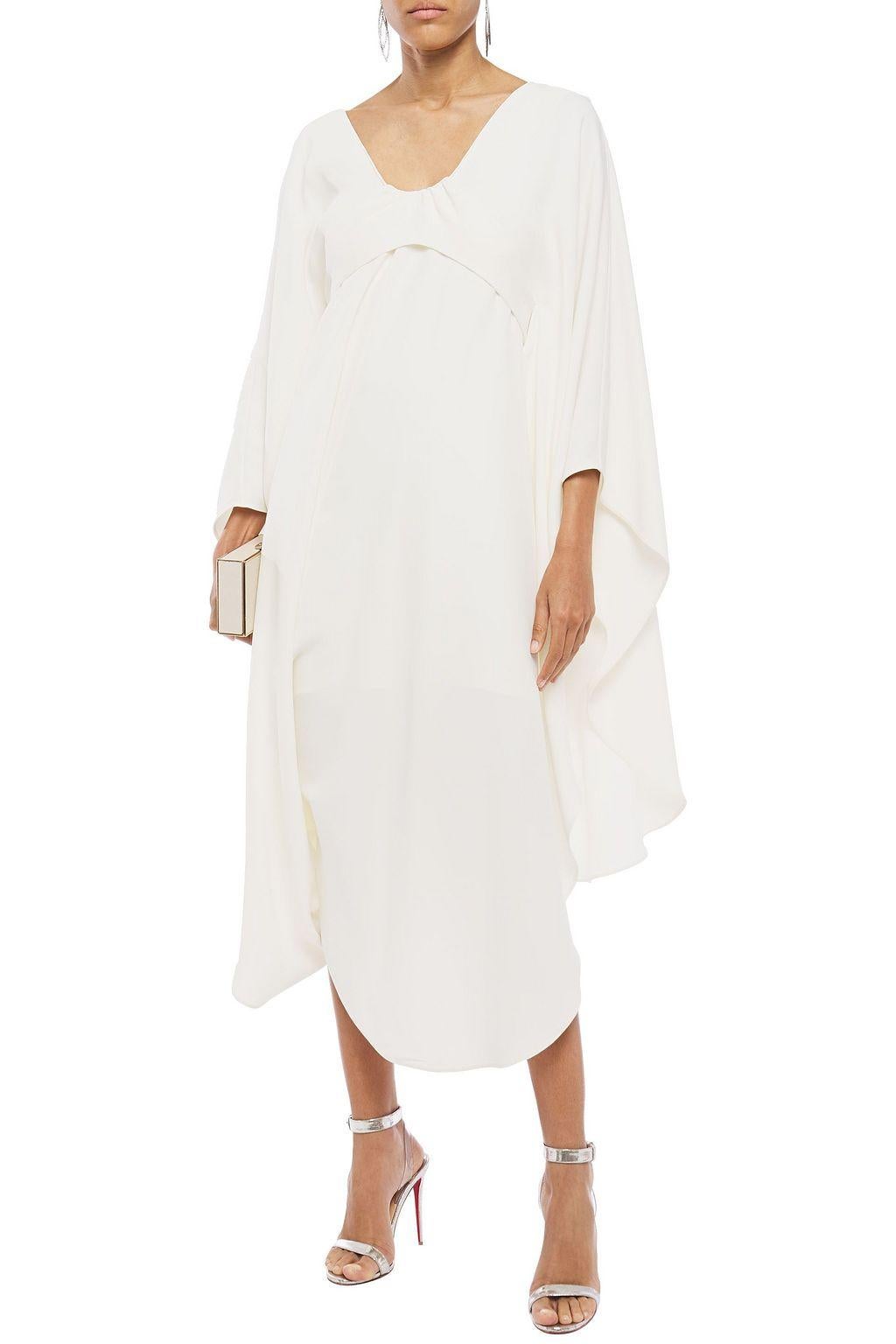 INCREDIBLE VALENTINO GRECIAN GODDESS IVORY SILK EVENING GOWN

Gorgeous off-white evening gown inspired by the Grecian goddesses by VALENTINO.

Details:

Draped Neckline
Three-quarters
Concealed zip
Cape overlay
Ties at back
Cowl hem
Silk
Dry